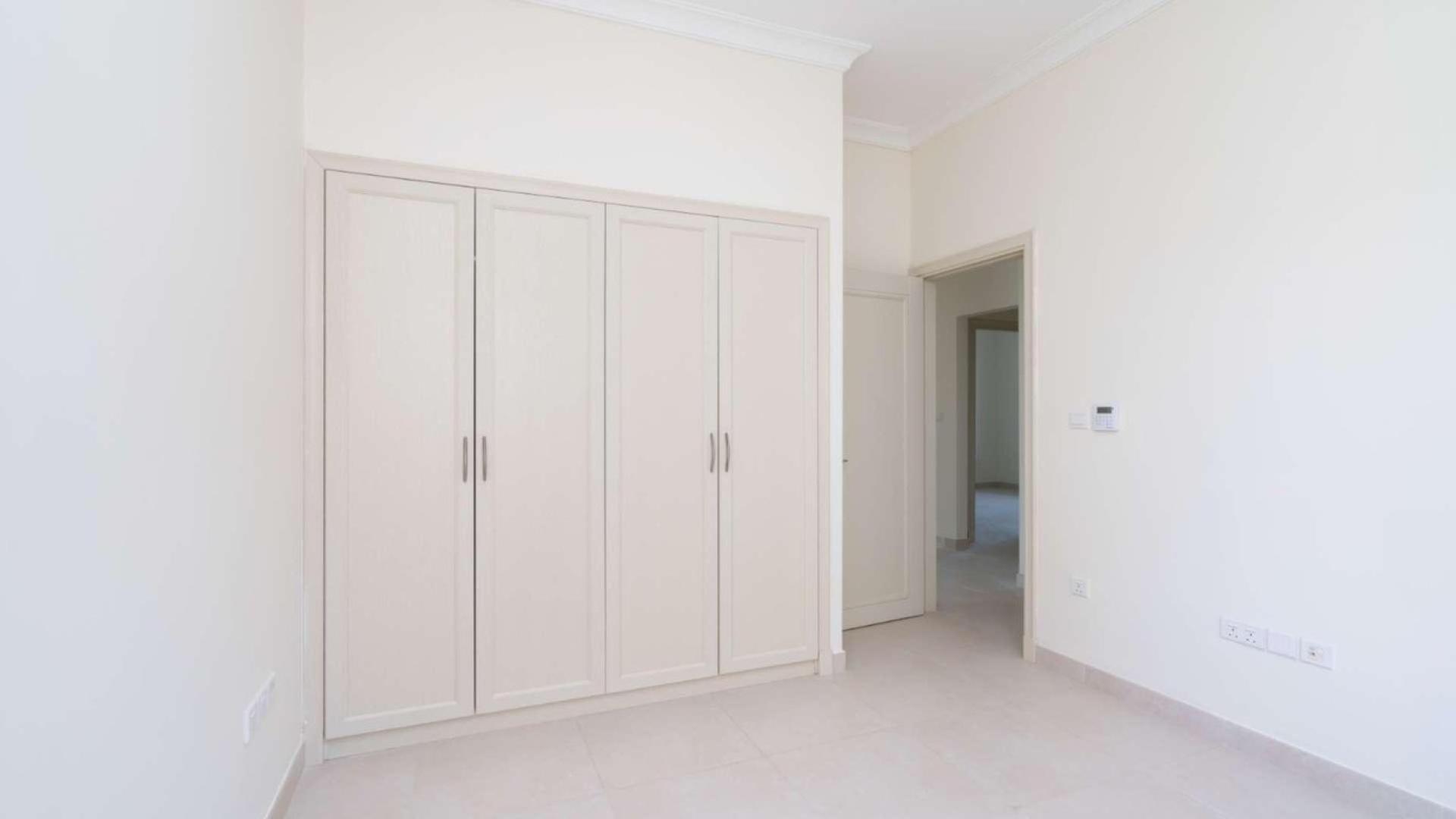 Spacious bedroom with built-in wardrobe in Arabian Ranches 2 villa for rent, Palma community