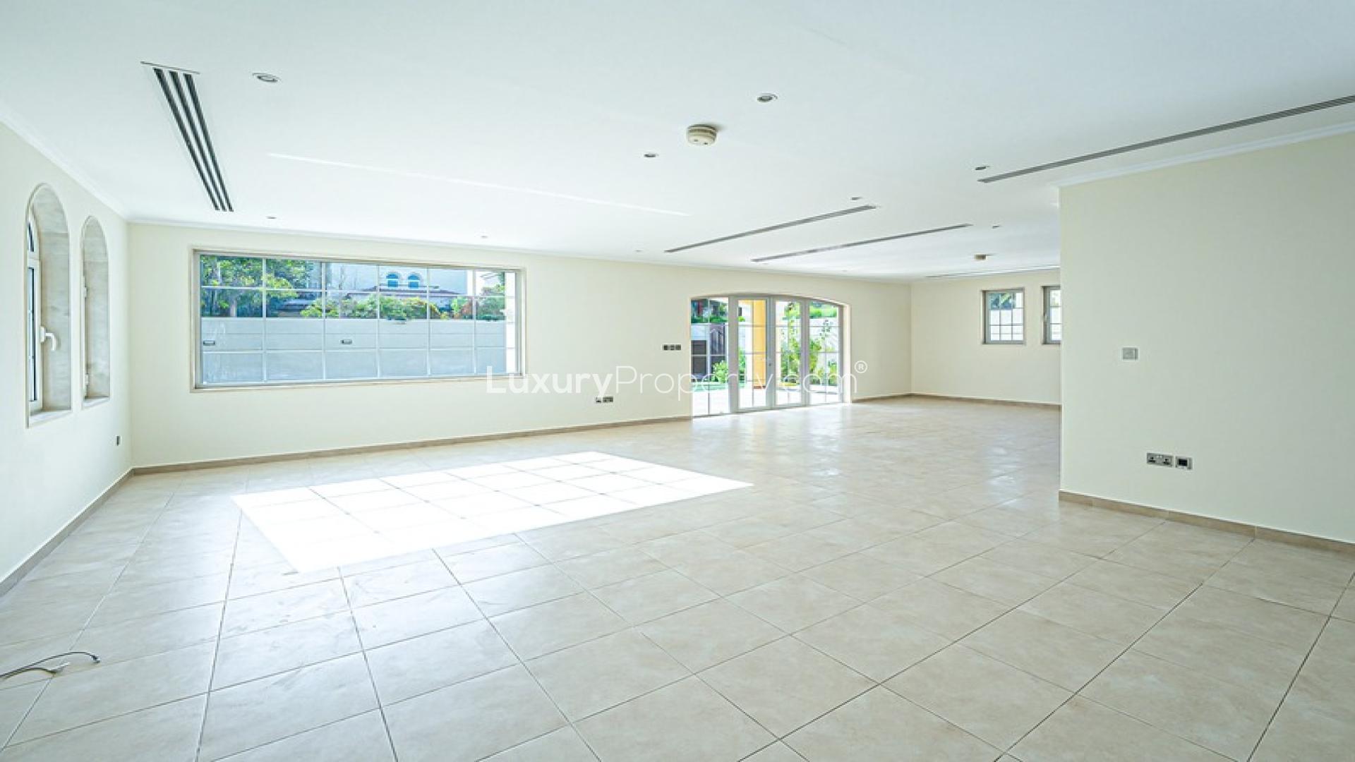 Spacious living area with staircase in Jumeirah Park villa, LP41243, available for rent