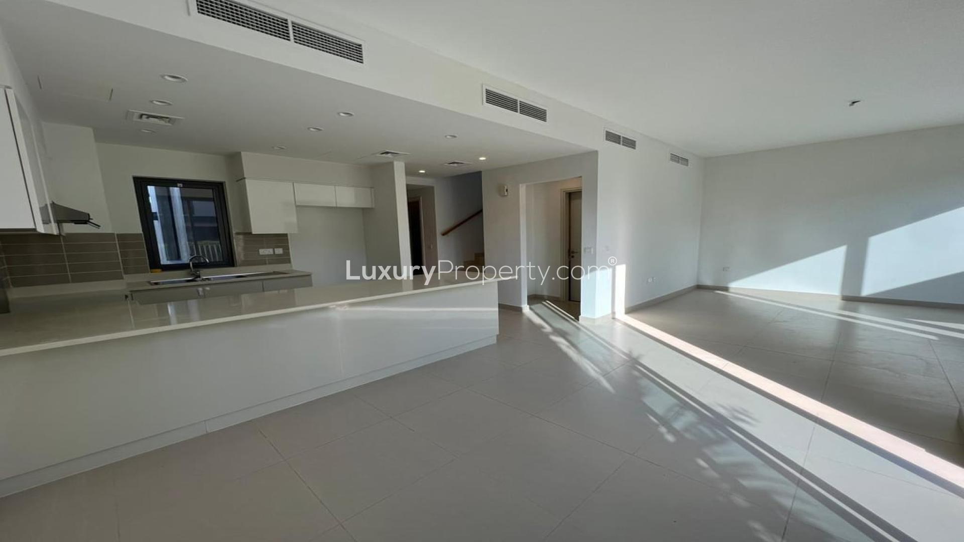 Luxurious 4-bedroom villa exterior with garden in Maple, Dubai Hills Estate for rent