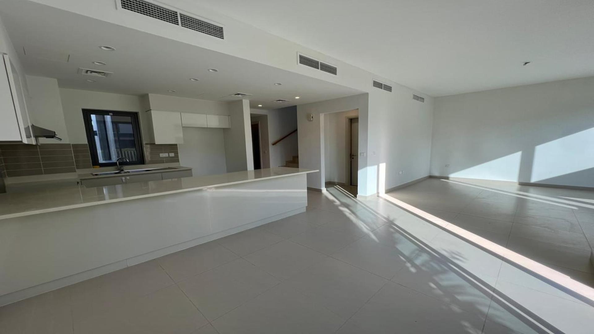 Luxurious 4-bedroom villa exterior with garden in Maple, Dubai Hills Estate for rent