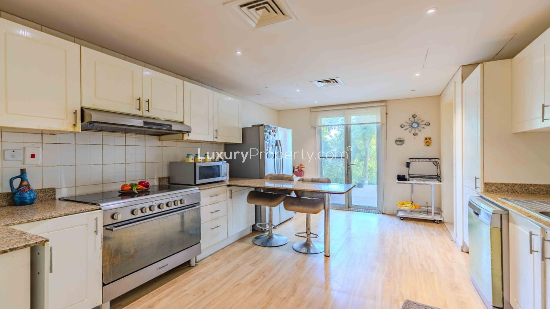 Bright living room with modern decor in 4-bedroom villa, The Springs, for rent