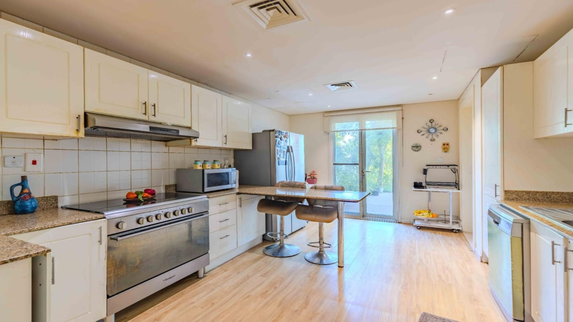 Bright living room with modern decor in 4-bedroom villa, The Springs, for rent