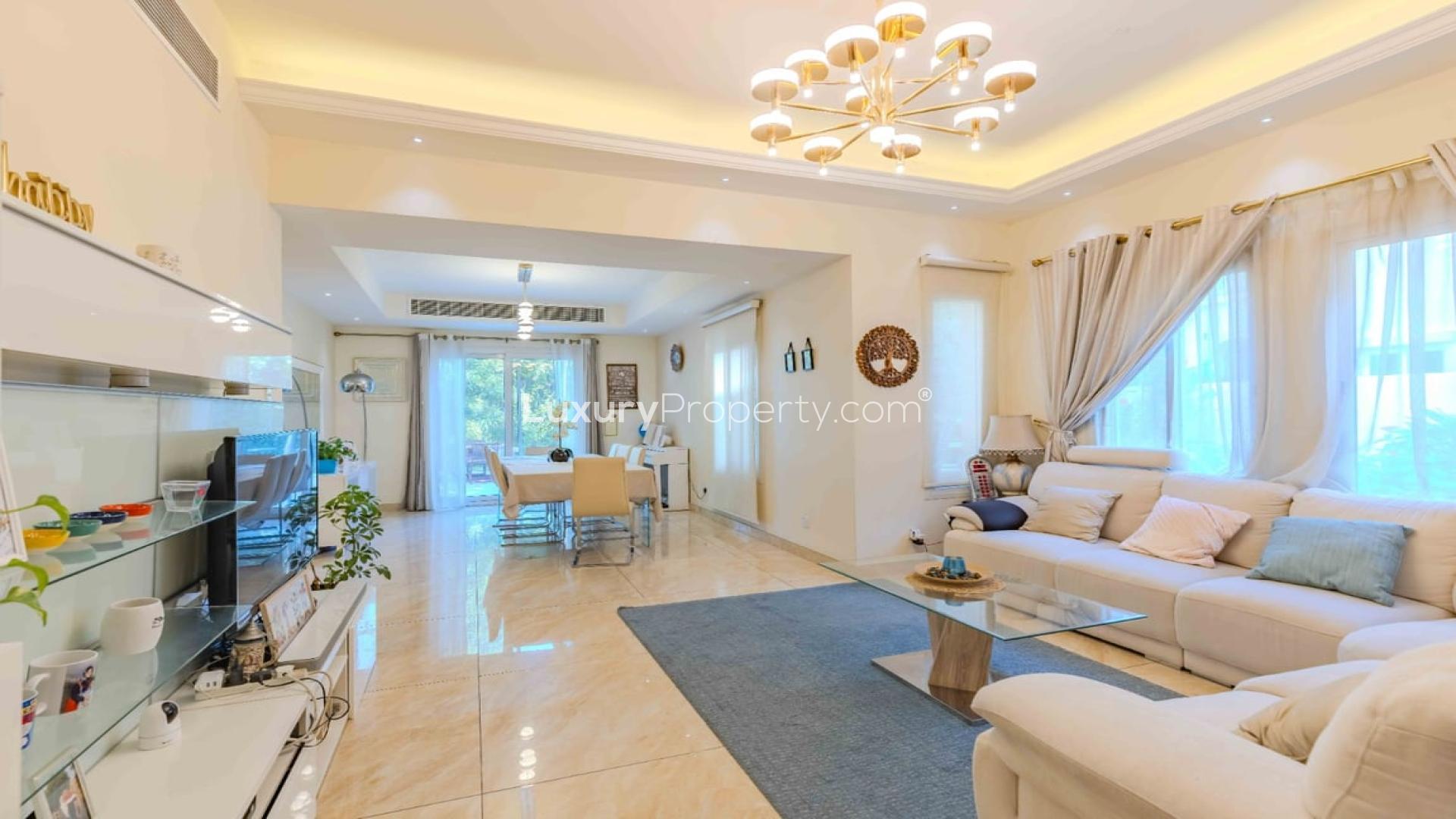 Bright living room in 4-bedroom villa, The Springs, with elegant decor and modern furnishings