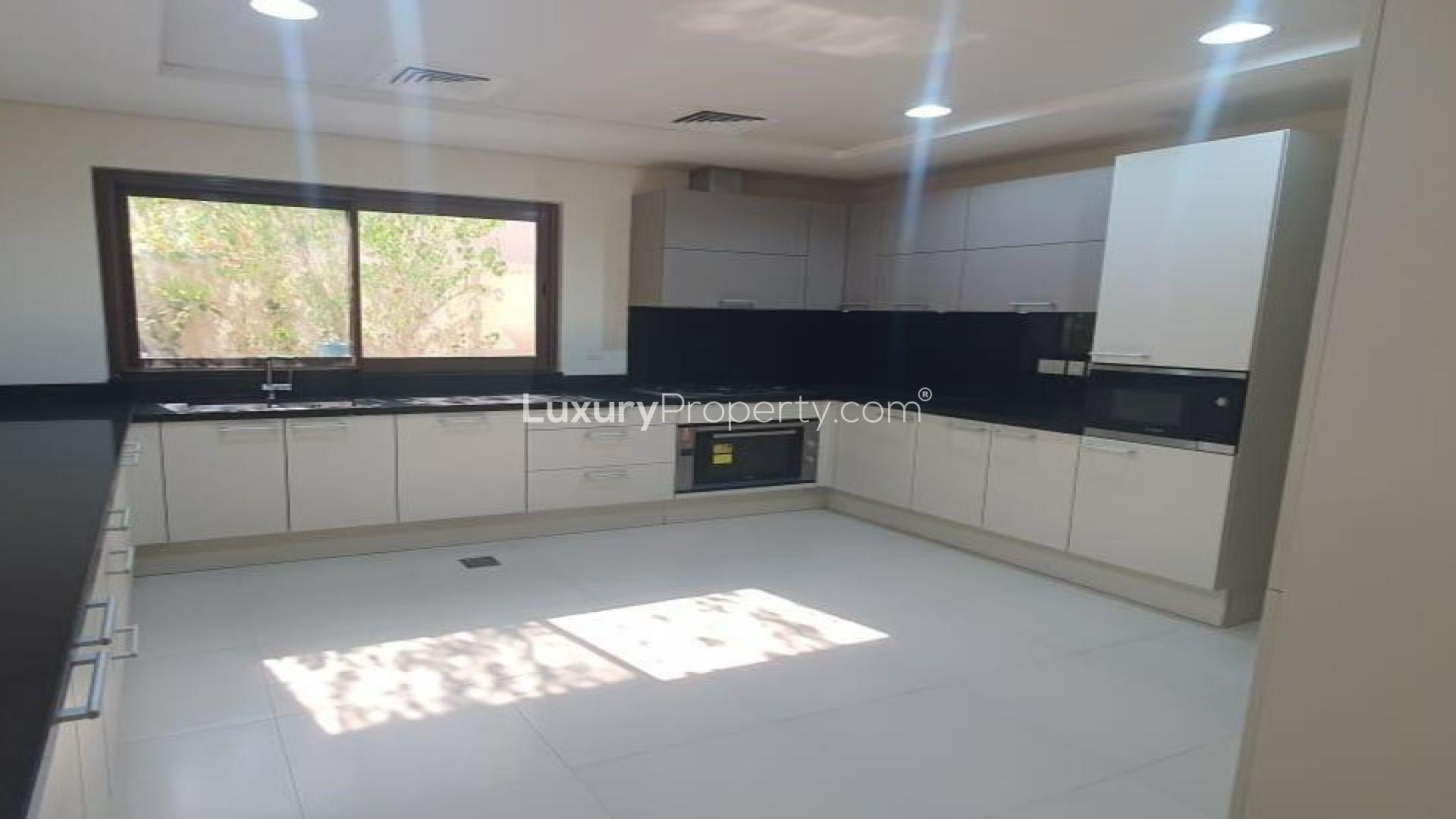 Spacious living room with elegant chandelier in 4-bedroom villa, Meydan Gated Community