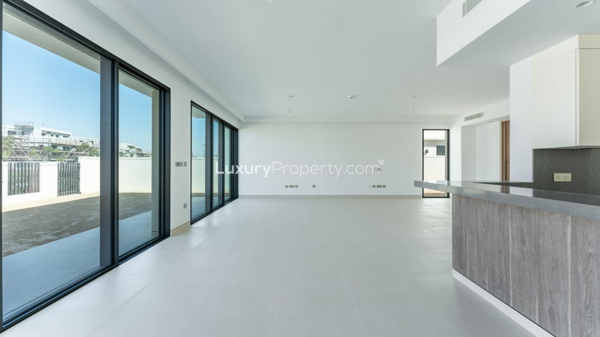 Spacious villa interior with large windows, Tilal Al Ghaf, Harmony community, for rent