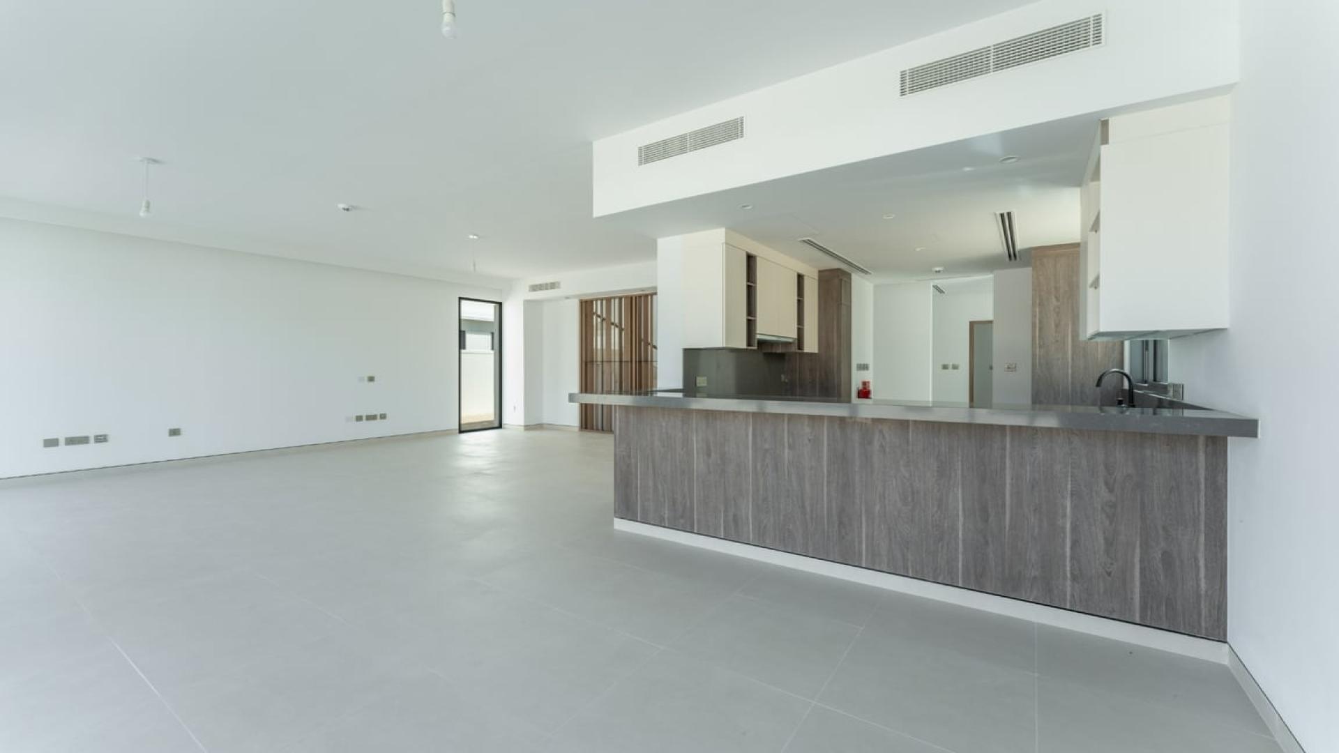 Modern kitchen in brand new 4-bedroom villa for rent, Tilal Al Ghaf, Harmony community
