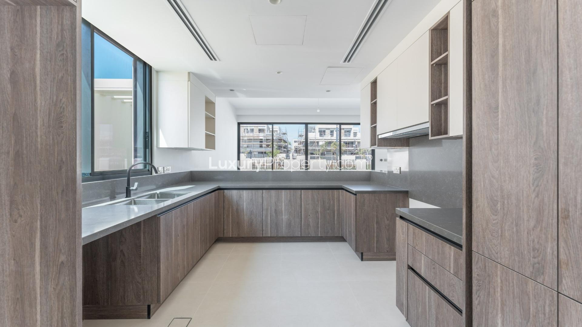 Brand new villa interior with open-plan kitchen in Tilal Al Ghaf, Harmony