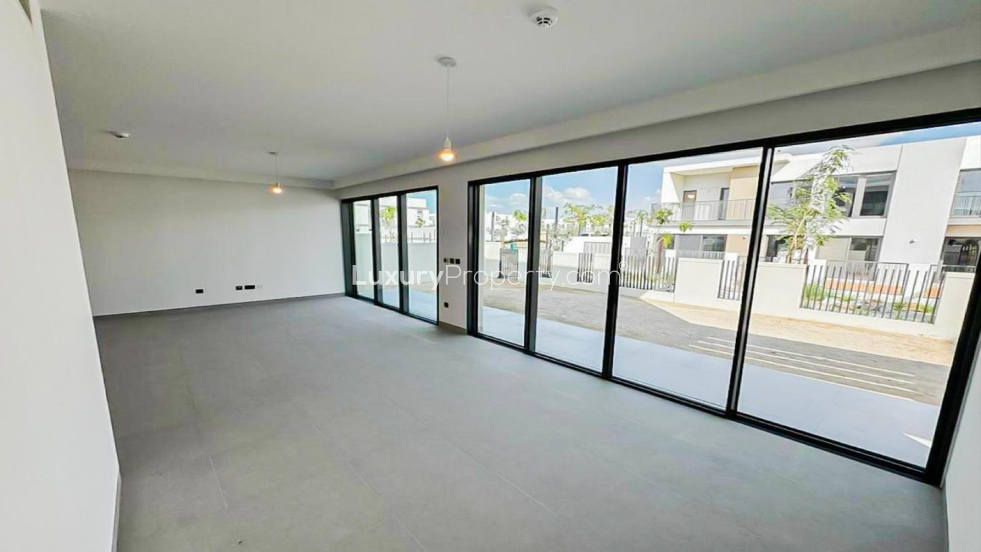 Modern 4-bedroom villa exterior in Tilal Al Ghaf's Harmony community for rent