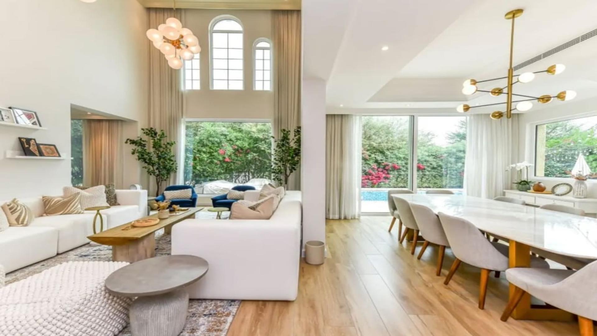 Luxurious living room in European Clusters villa, Jumeirah Islands, with elegant decor and seating