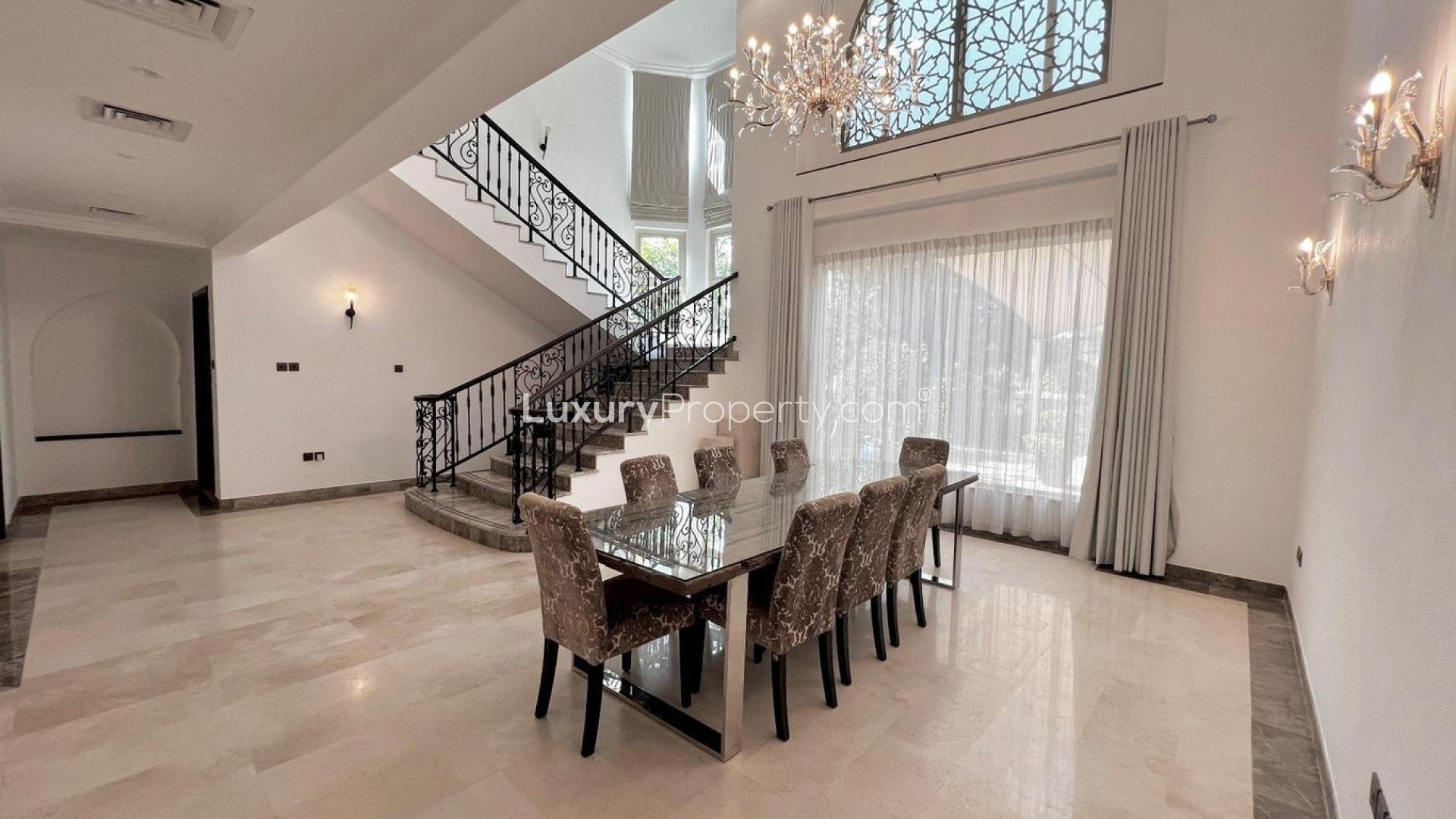 Outdoor pool area with shade sails at European Clusters villa, Jumeirah Islands