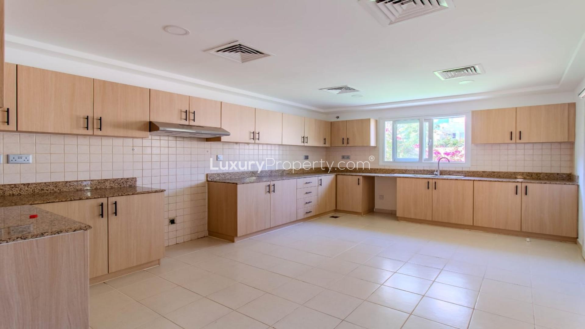 Spacious modern kitchen in upgraded 4-bedroom villa, Meadows 2, Dubai, available for rent