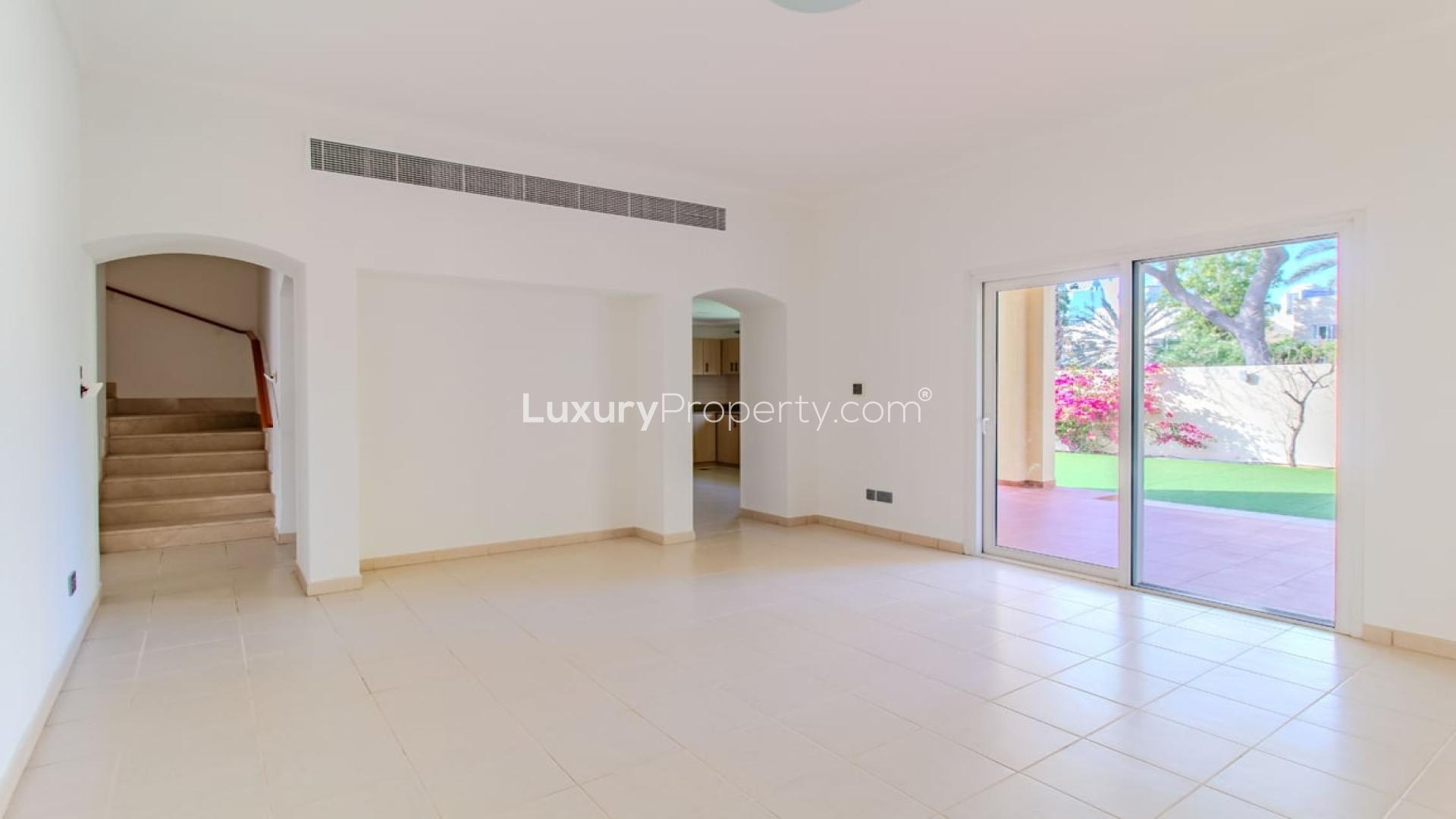 Upgraded villa exterior with garden in Meadows 2, Dubai, available for rent