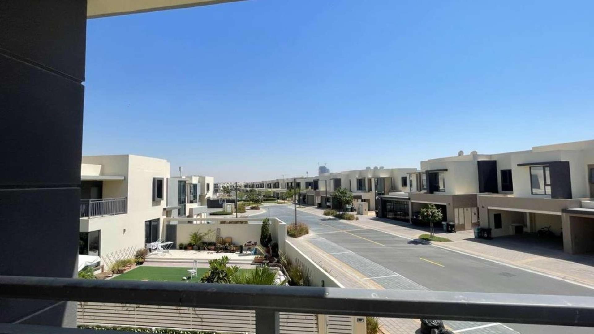 Modern kitchen and living area in 4-bedroom villa, Maple 2, Dubai Hills Estate