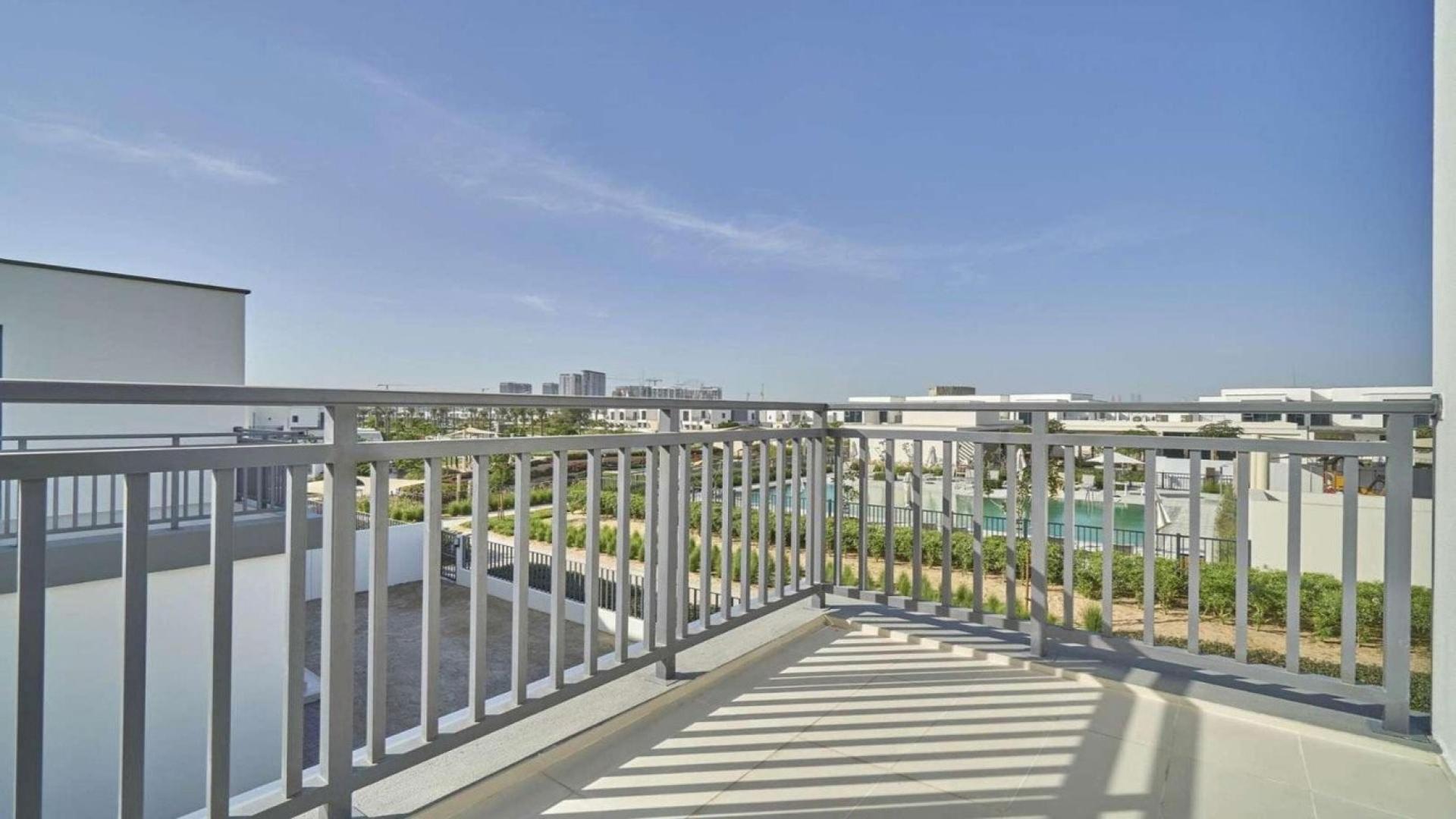 Luxurious villa interior with large windows overlooking Dubai Hills Estate, Maple 3 community view