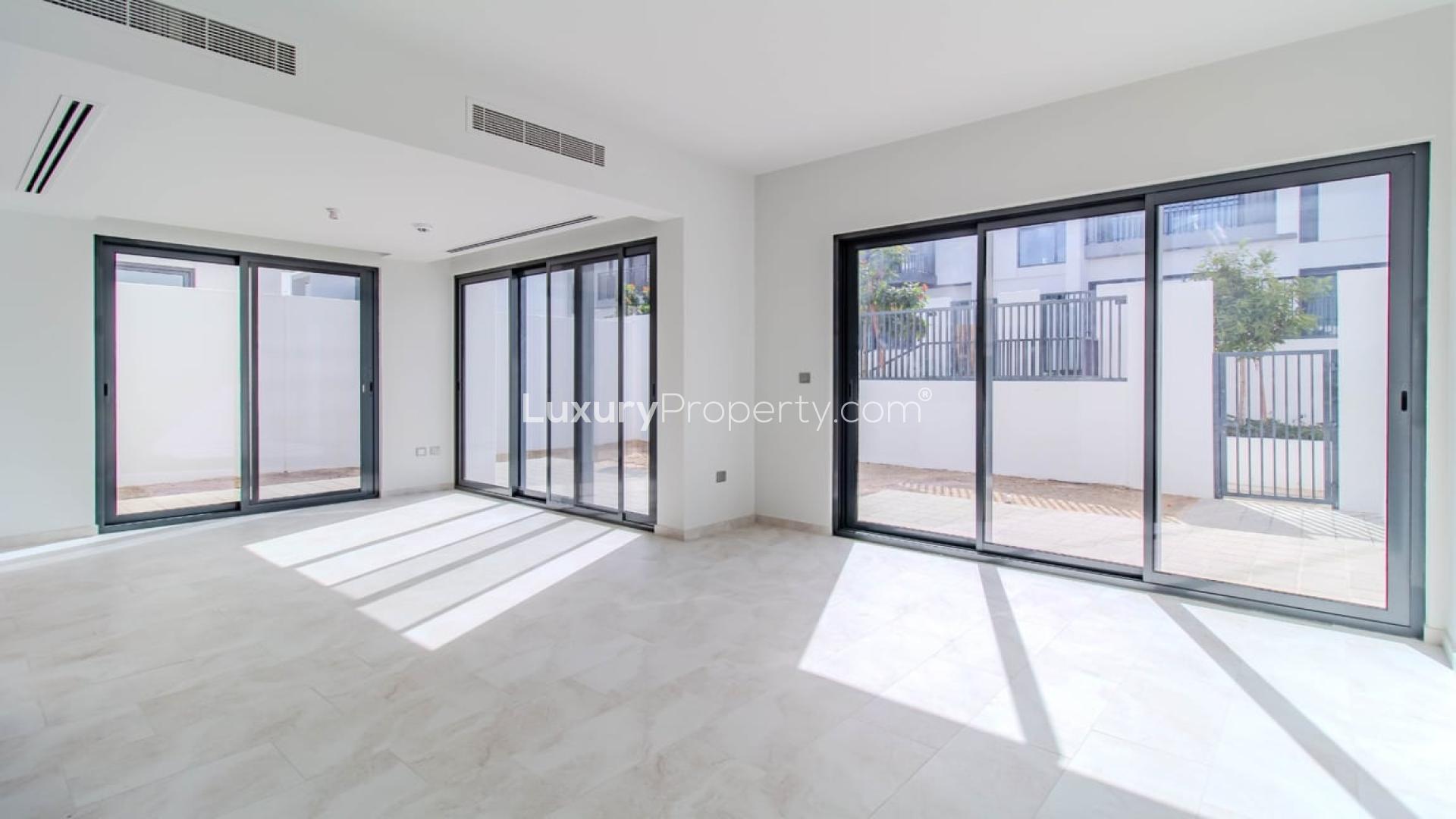 Elegant villa exterior with carport in Villanova, Dubai Land, available for rent