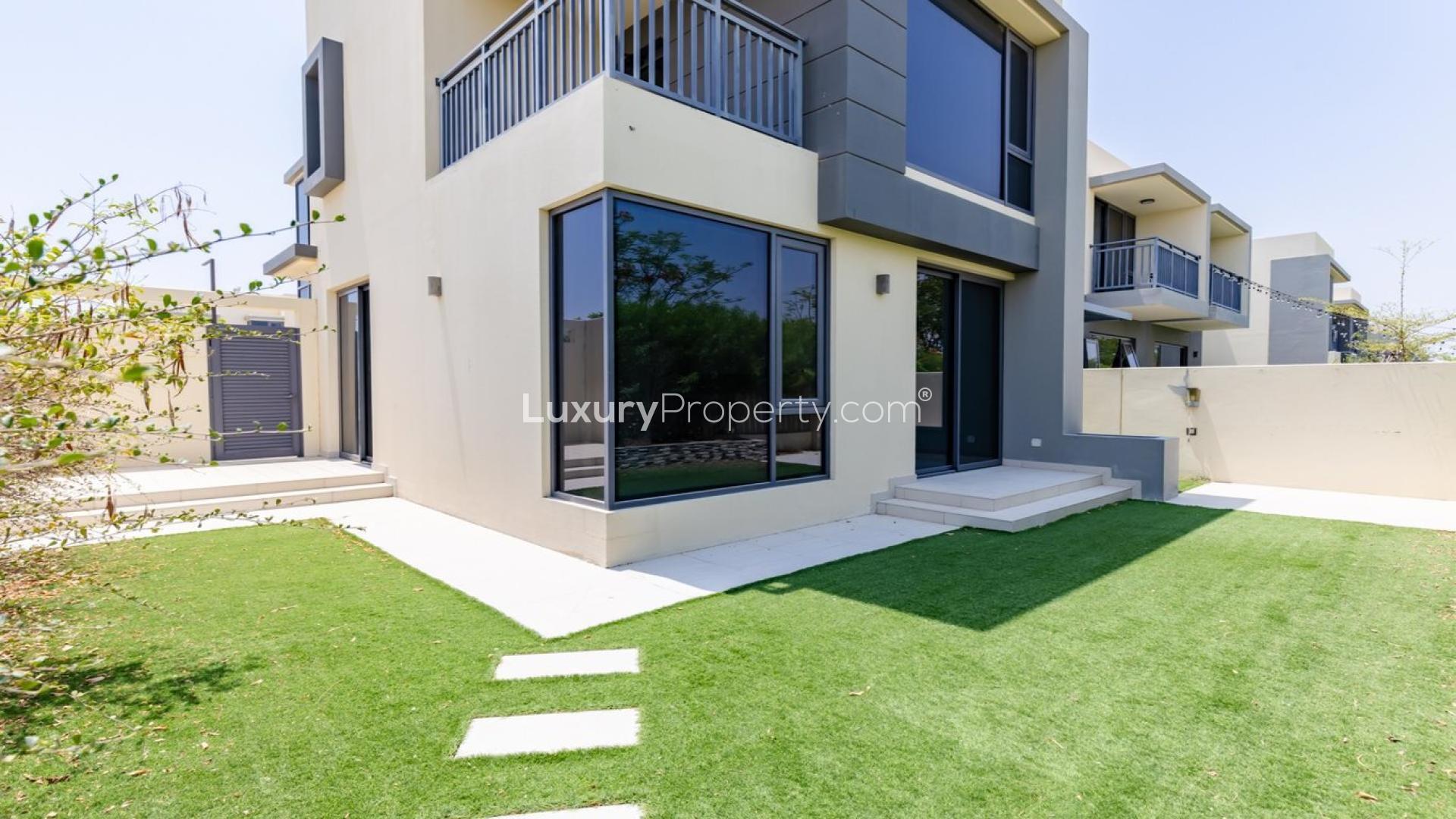 Modern kitchen and living area in 4-bedroom villa, Maple 3, Dubai Hills Estate