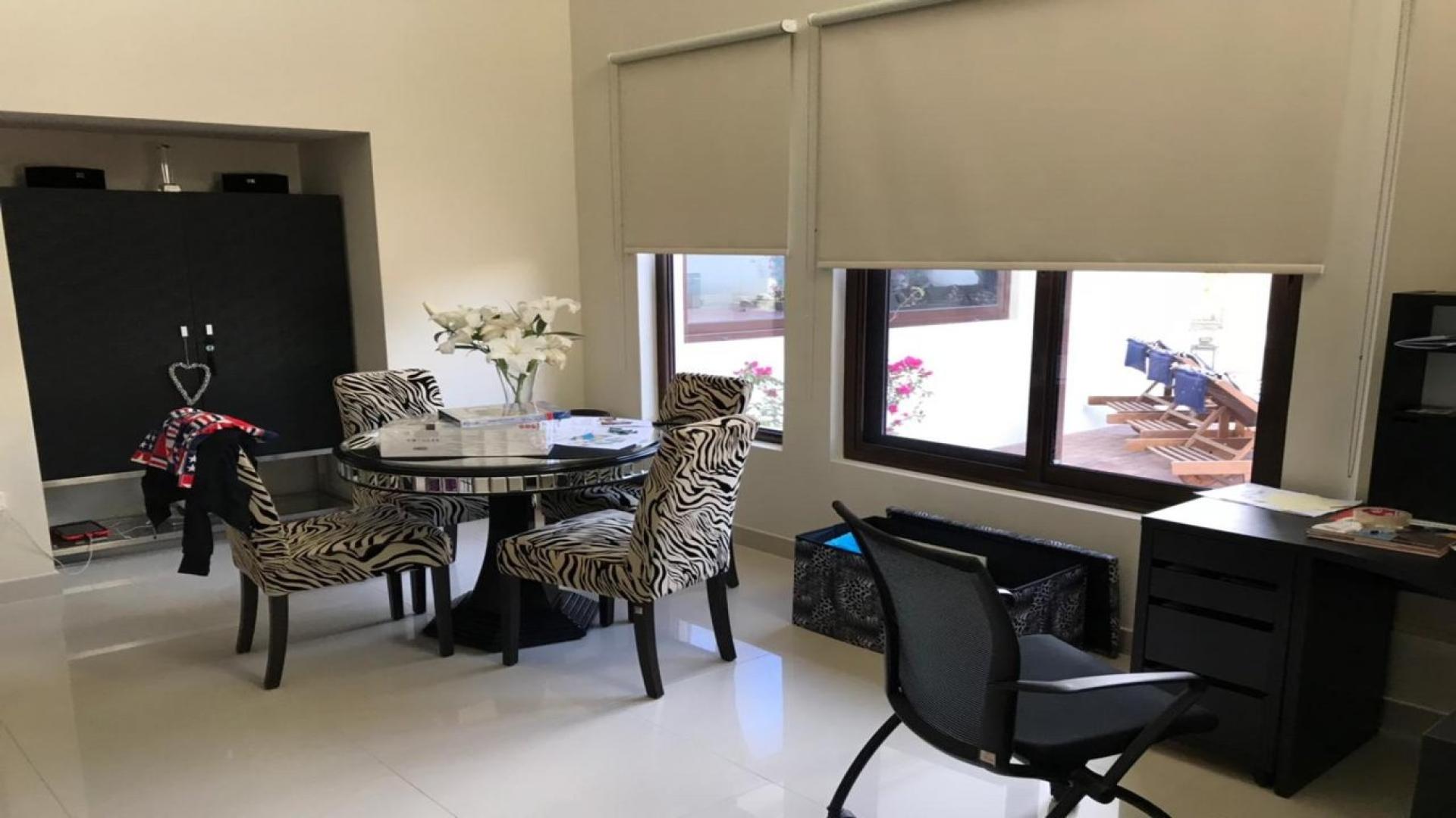 Outdoor seating area and gazebo in Arabian Ranches 2 villa, Rosa sub-community