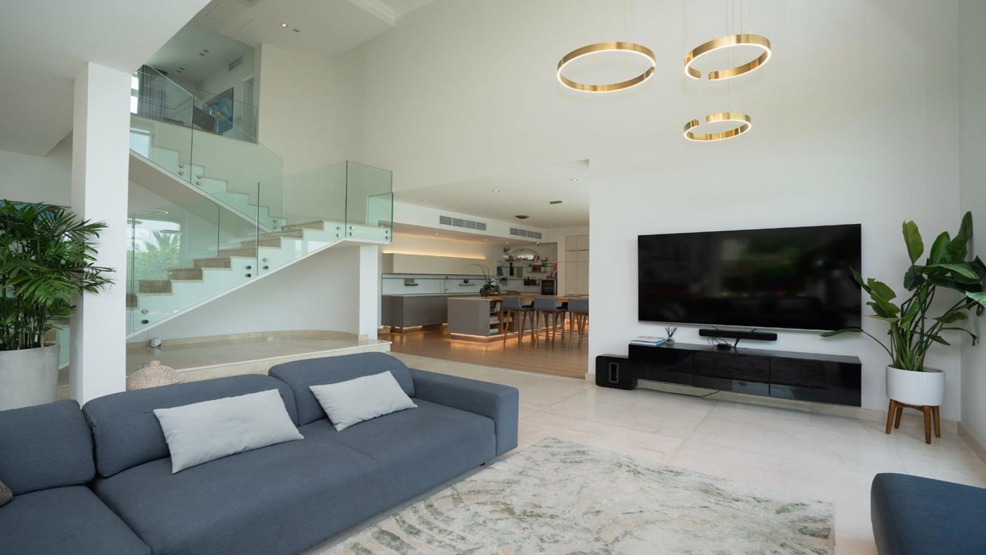 Modern kitchen in European Clusters villa, Jumeirah Islands, with island and garden view