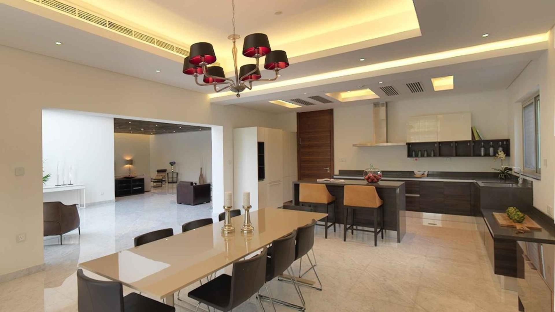 Contemporary 4-bedroom villa exterior in District One, MBR City, for sale