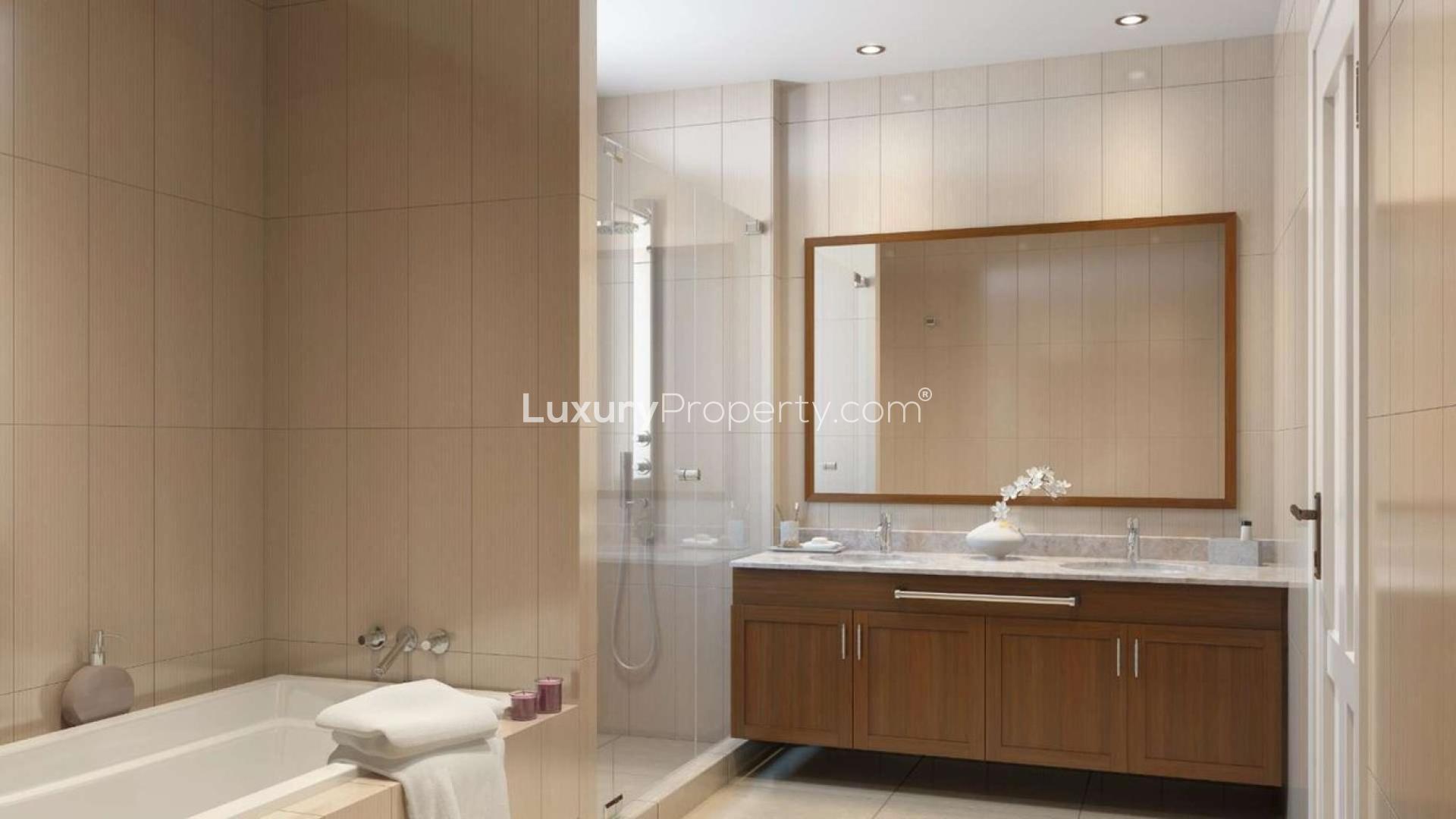 Four-bedroom villa exterior in Villanova, Dubai with palm trees and modern architecture