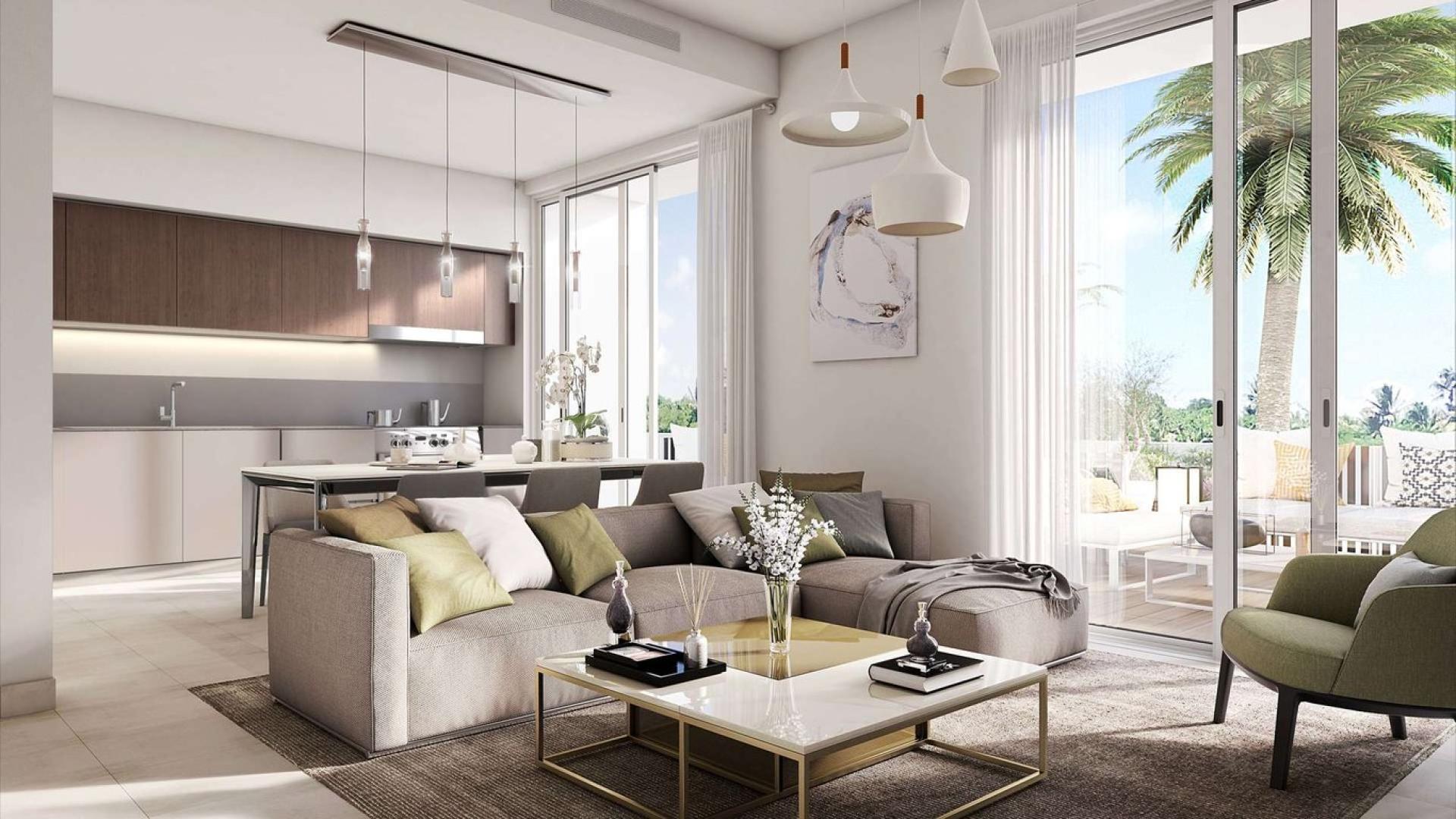 Modern living room in 4-bed villa, EMAAR South, Dubai South, with open kitchen and patio view