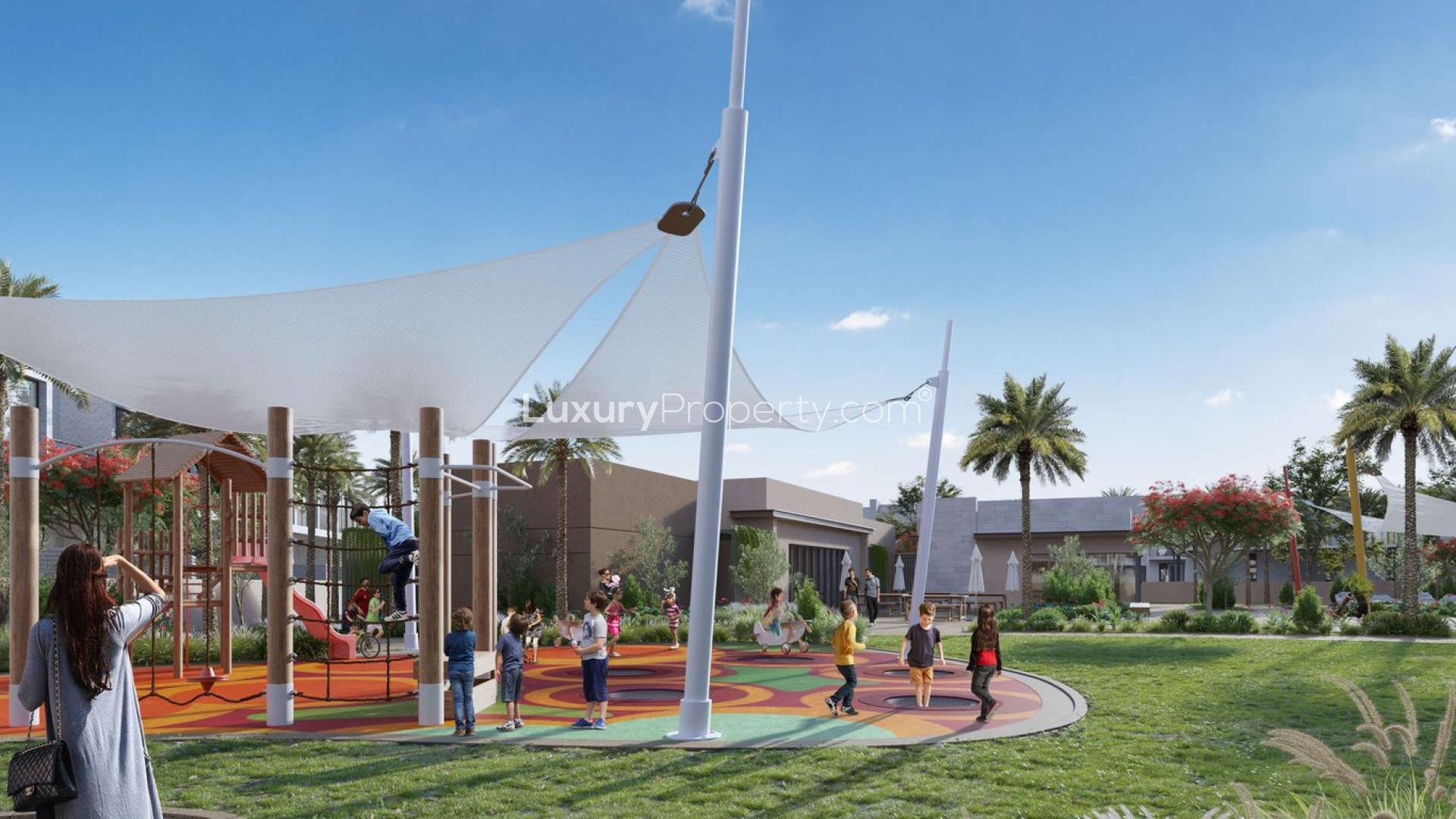 Children playing in vibrant park at Expo Golf Villas Phase II, Dubai South