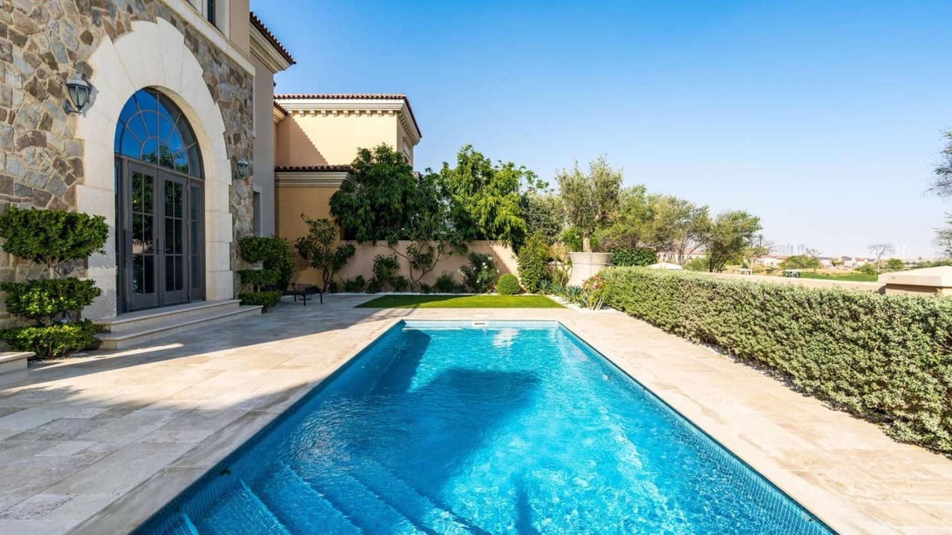 Luxurious living room in Whispering Pines villa, Jumeirah Golf Estates, with elegant decor