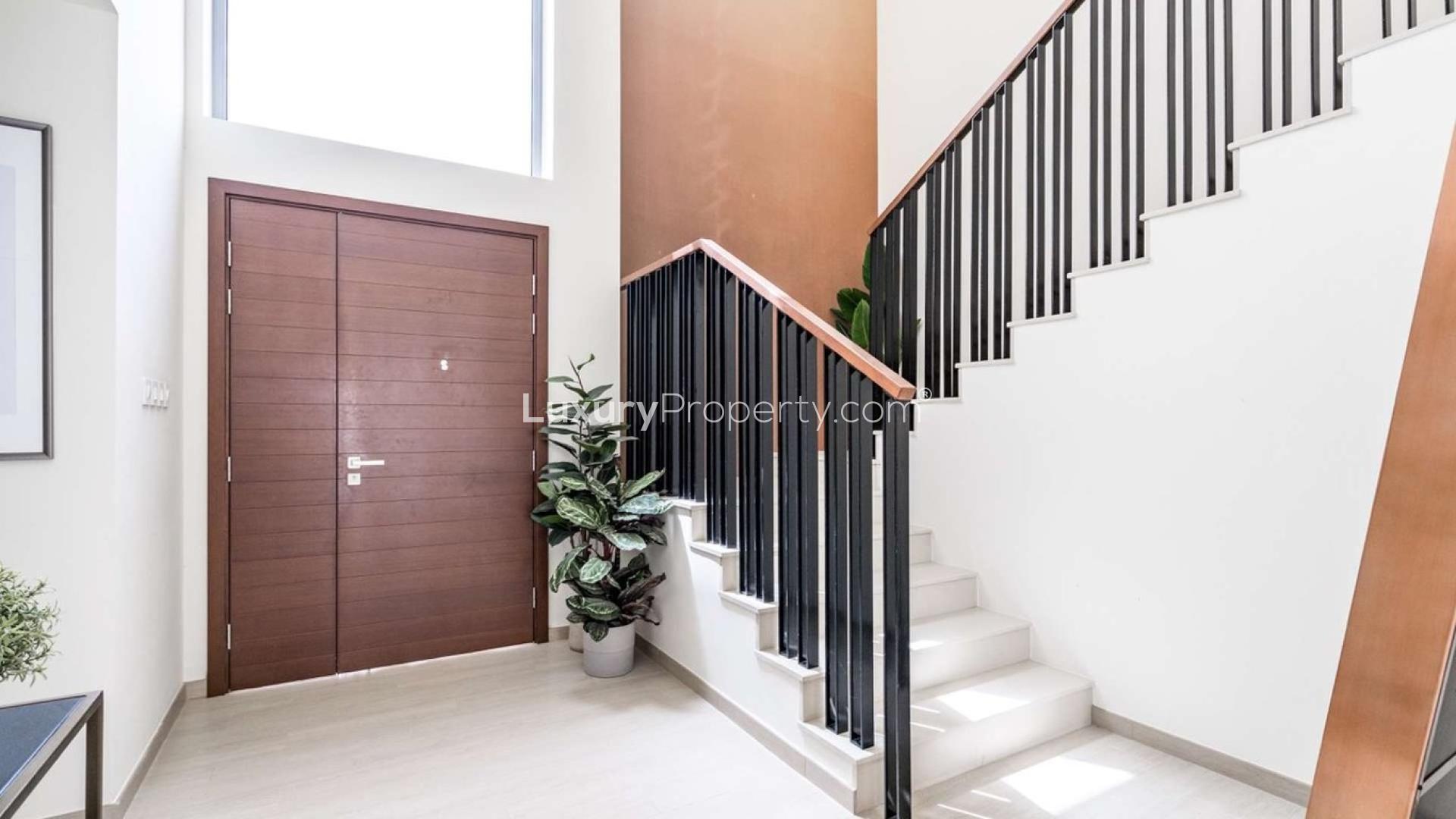 Luxurious living room in four-bedroom villa, Golf Links, Emaar South, with modern decor