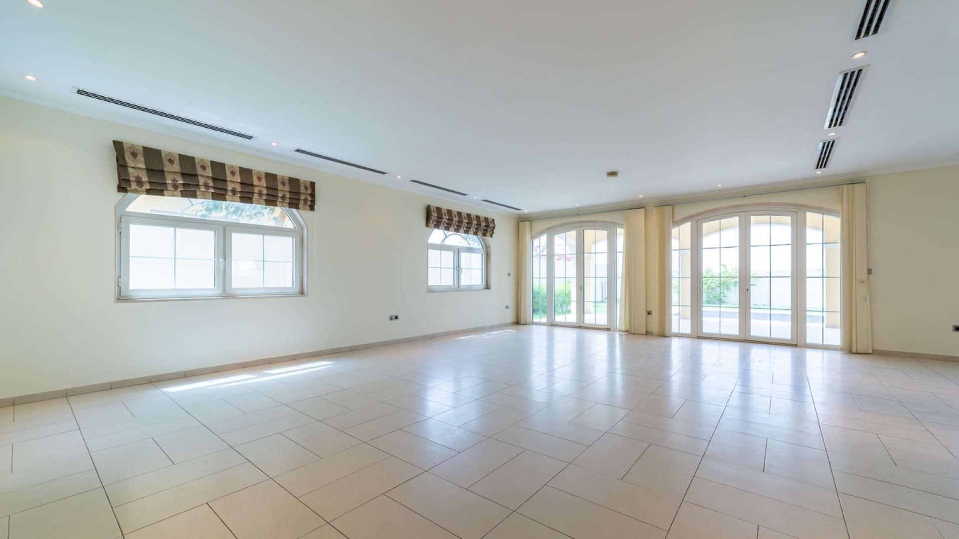 Exterior view of a well-maintained villa in Jumeirah Park, Legacy Nova Villas for sale