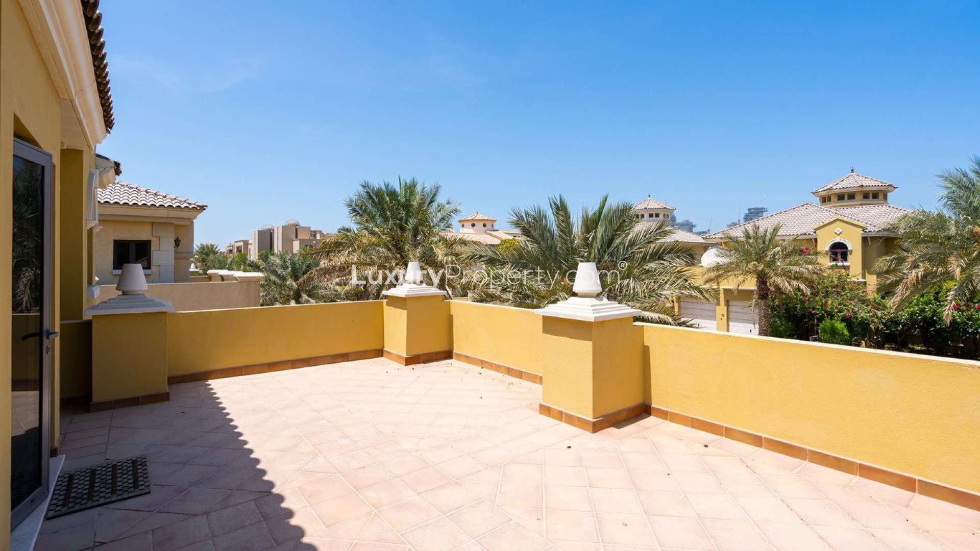 N/A,"Spacious terrace with palm views in Palm Jebel Ali villa, Garden Homes community.",Dining room in beachfront villa, Palm Jumeirah, with sea views and elegant decor