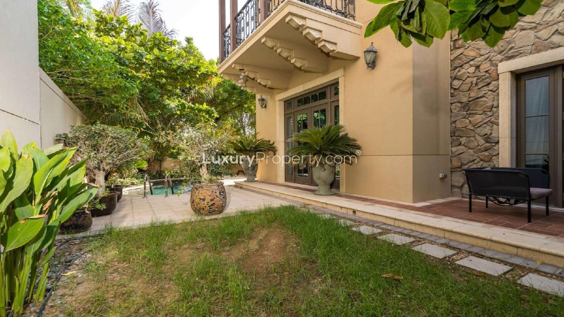 Private pool with lush greenery in Sawgrass Villa, Jumeirah Golf Estates