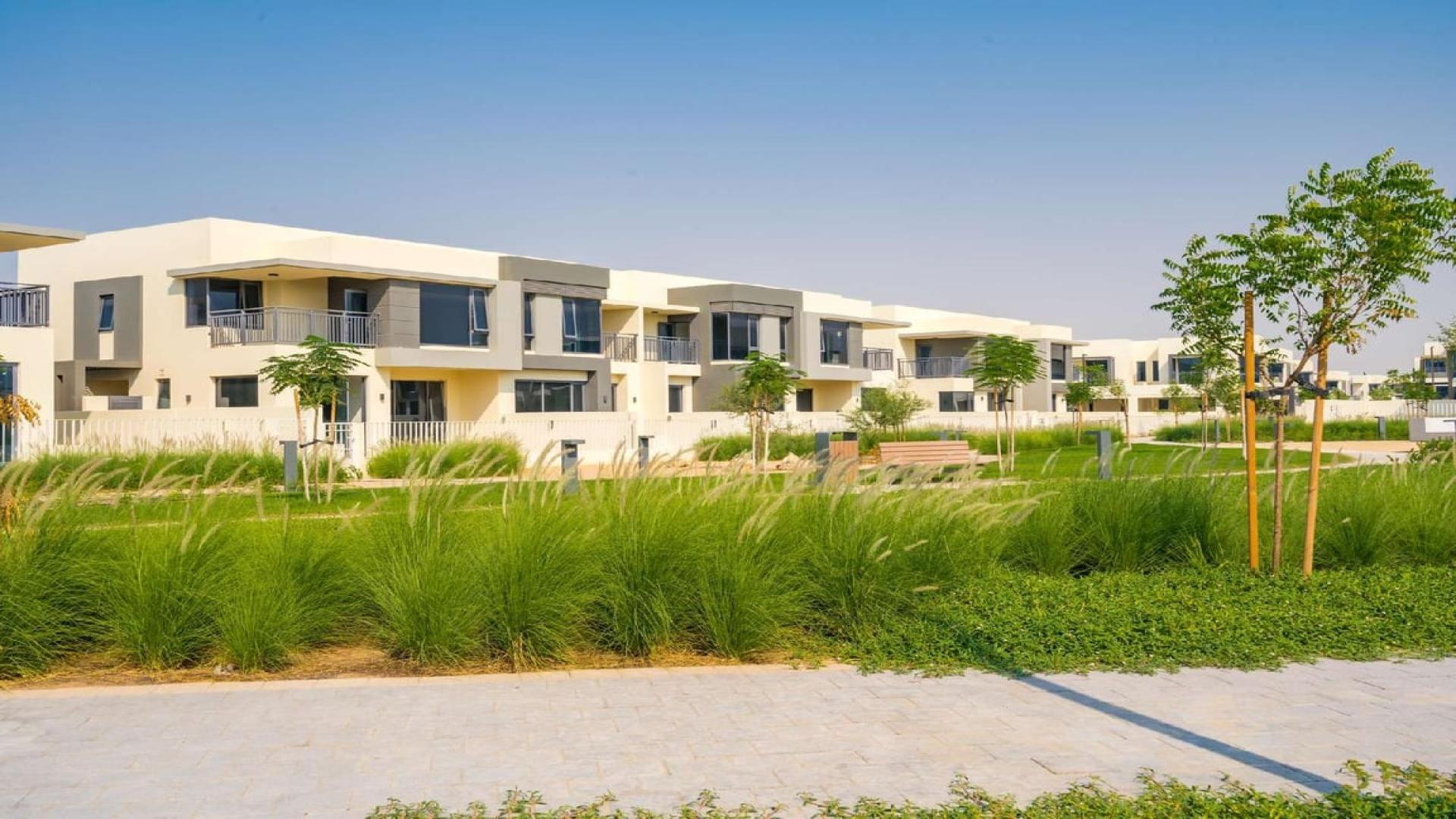 Bright living area with large windows in Maple at Dubai Hills Estate villa for rent