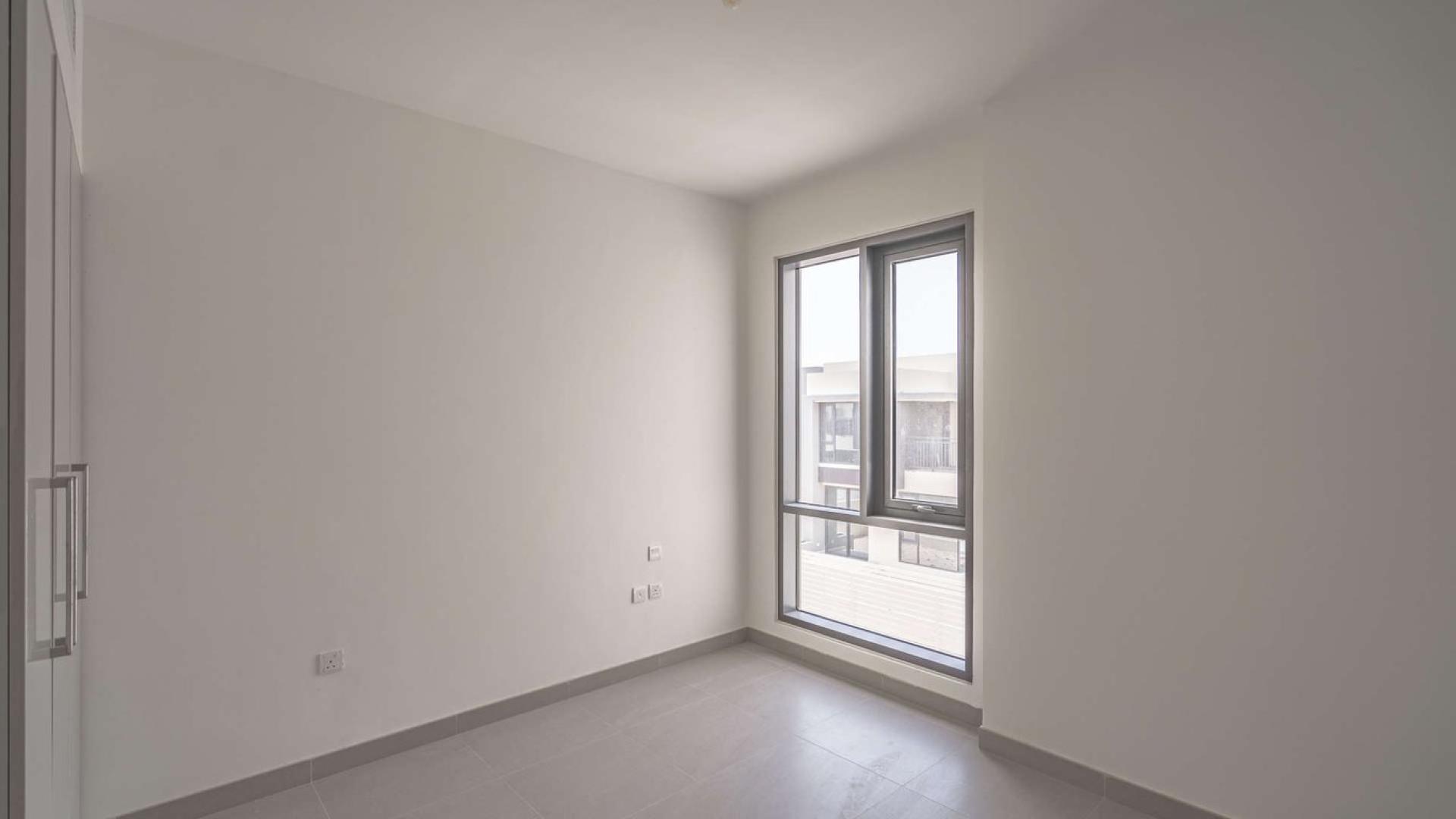 Modern kitchen and living area in four-bedroom townhouse, Maple at Dubai Hills Estate