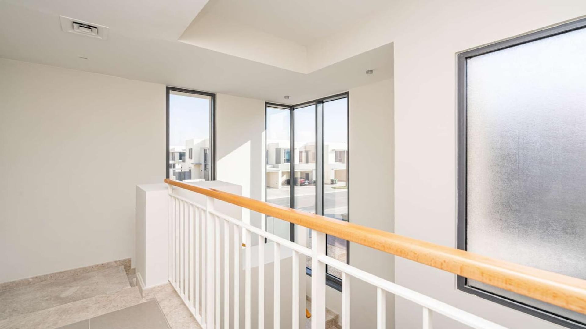 Bright kitchen and living area in Maple Dubai Hills Estate villa for sale