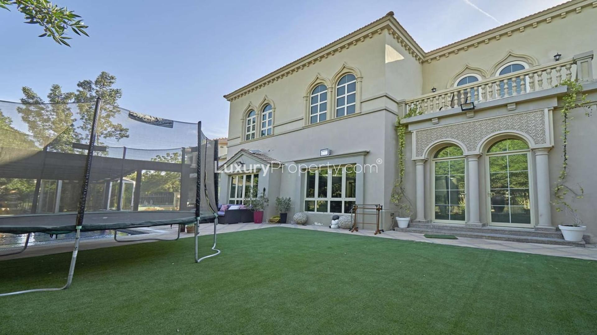 Luxurious living room with elegant staircase in Venetian-style villa, Jumeirah Islands
