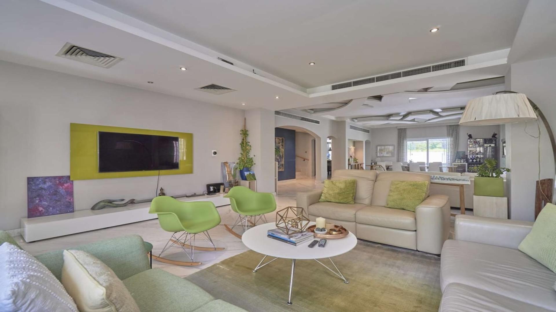 Elegant living and dining area in fully upgraded 4-bedroom villa, Meadows 4