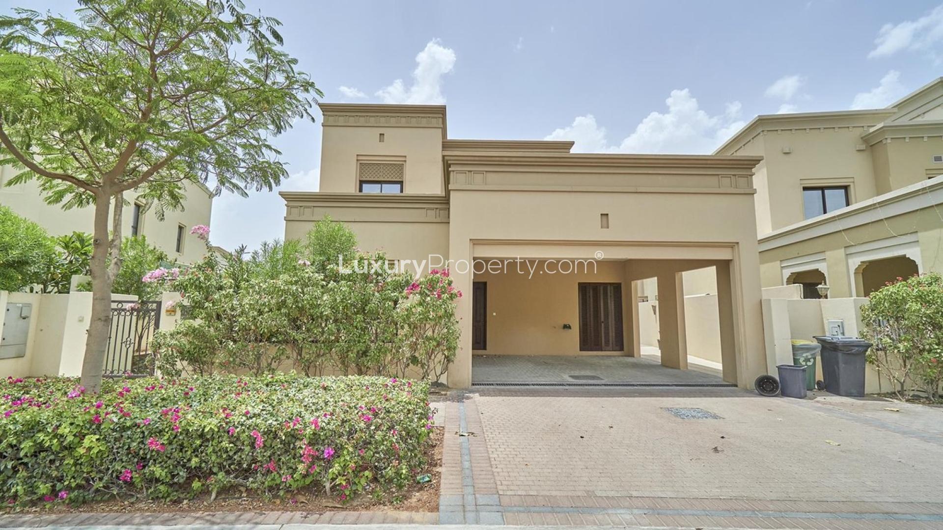 Single row villa exterior in Casa, Arabian Ranches 2, with lush garden space, for sale