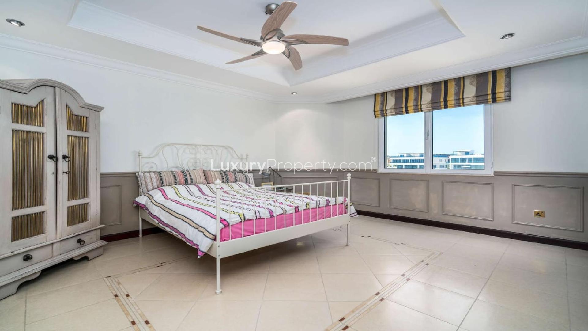 Elegant entryway of upgraded beachfront villa in Palm Jumeirah, featuring stylish decor