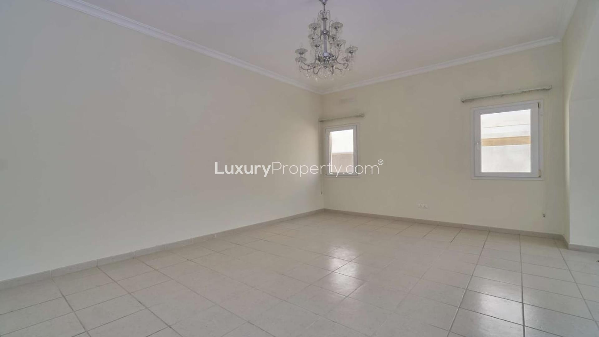 Exterior view of a vacant 4-bedroom villa for sale in Meadows 2 community