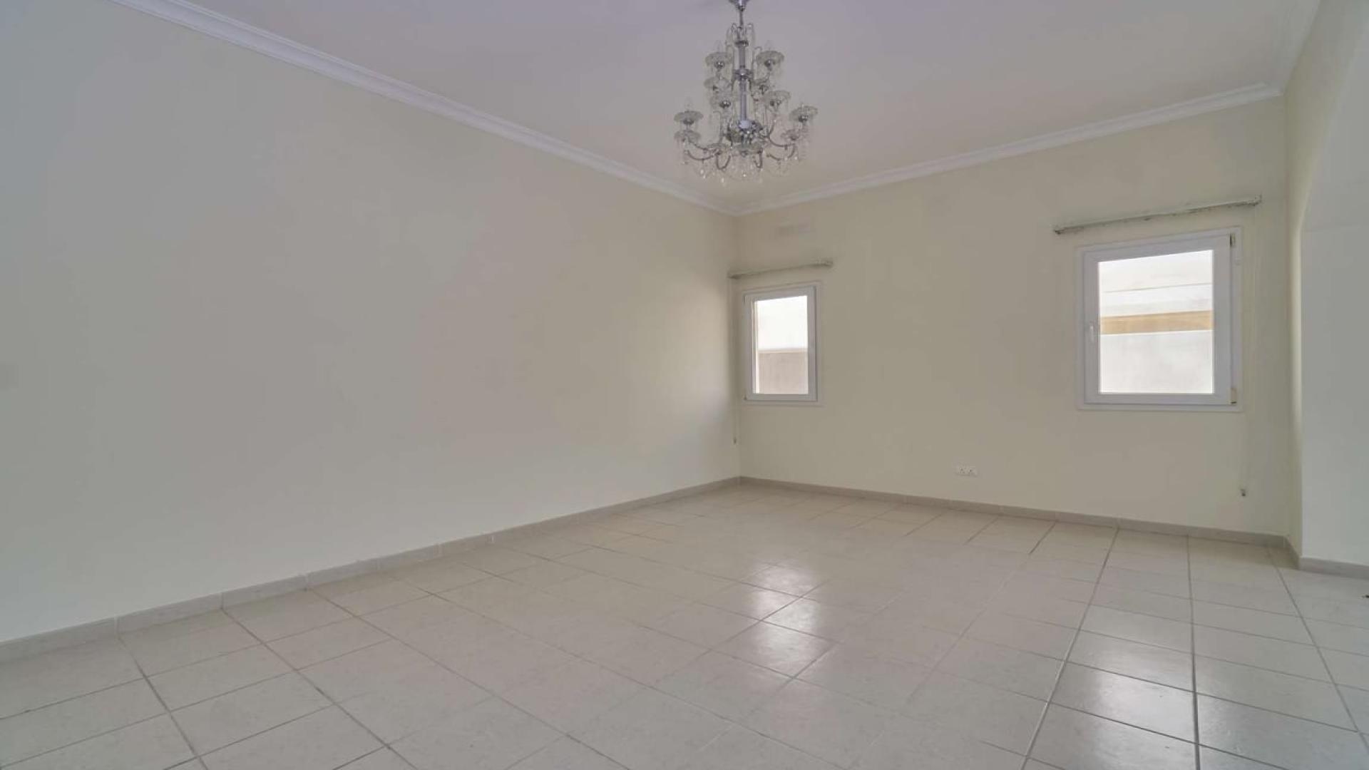 Exterior view of a vacant 4-bedroom villa for sale in Meadows 2 community