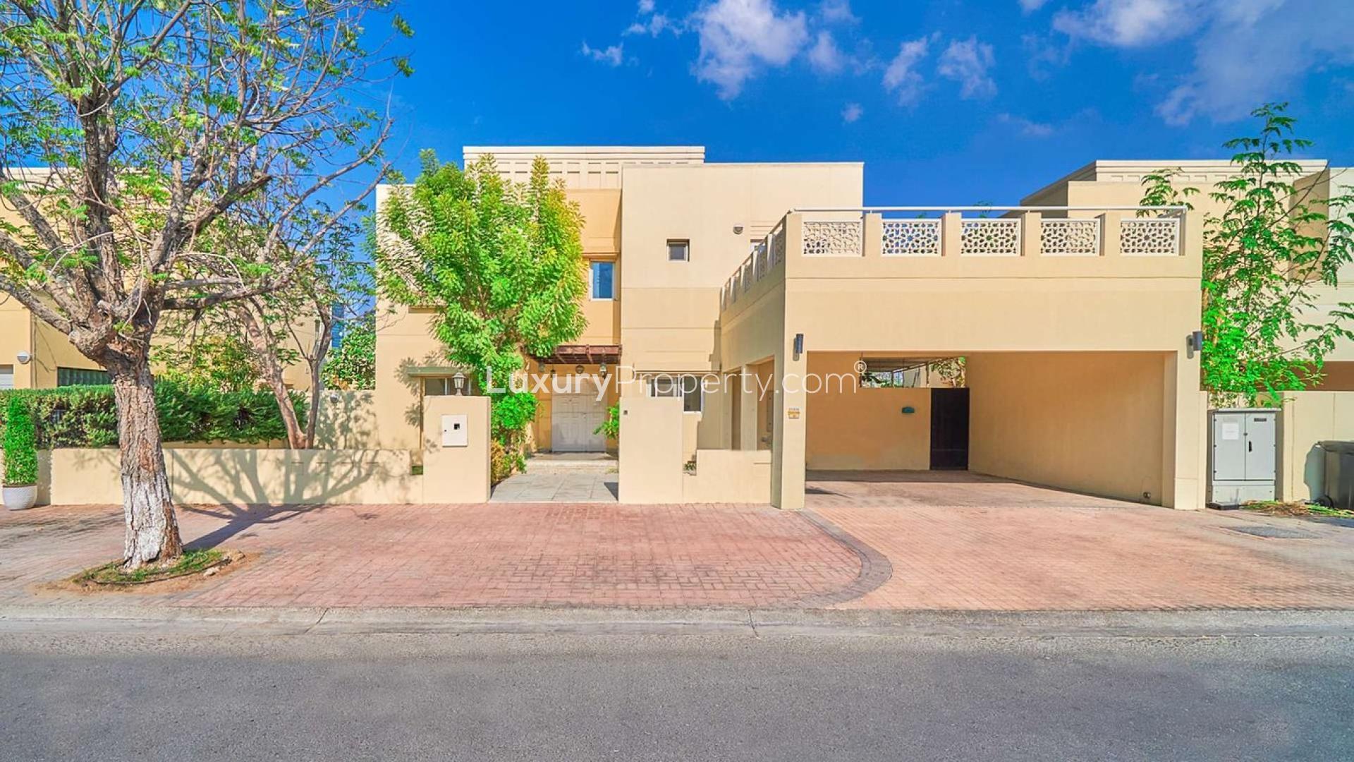 Exterior view of 4-bedroom villa for sale in Meadows 2, spacious driveway