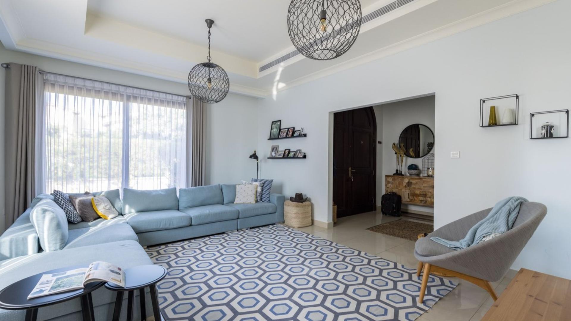 Exclusive 4-bedroom villa in Arabian Ranches II, Rosa community, with lush greenery and garage