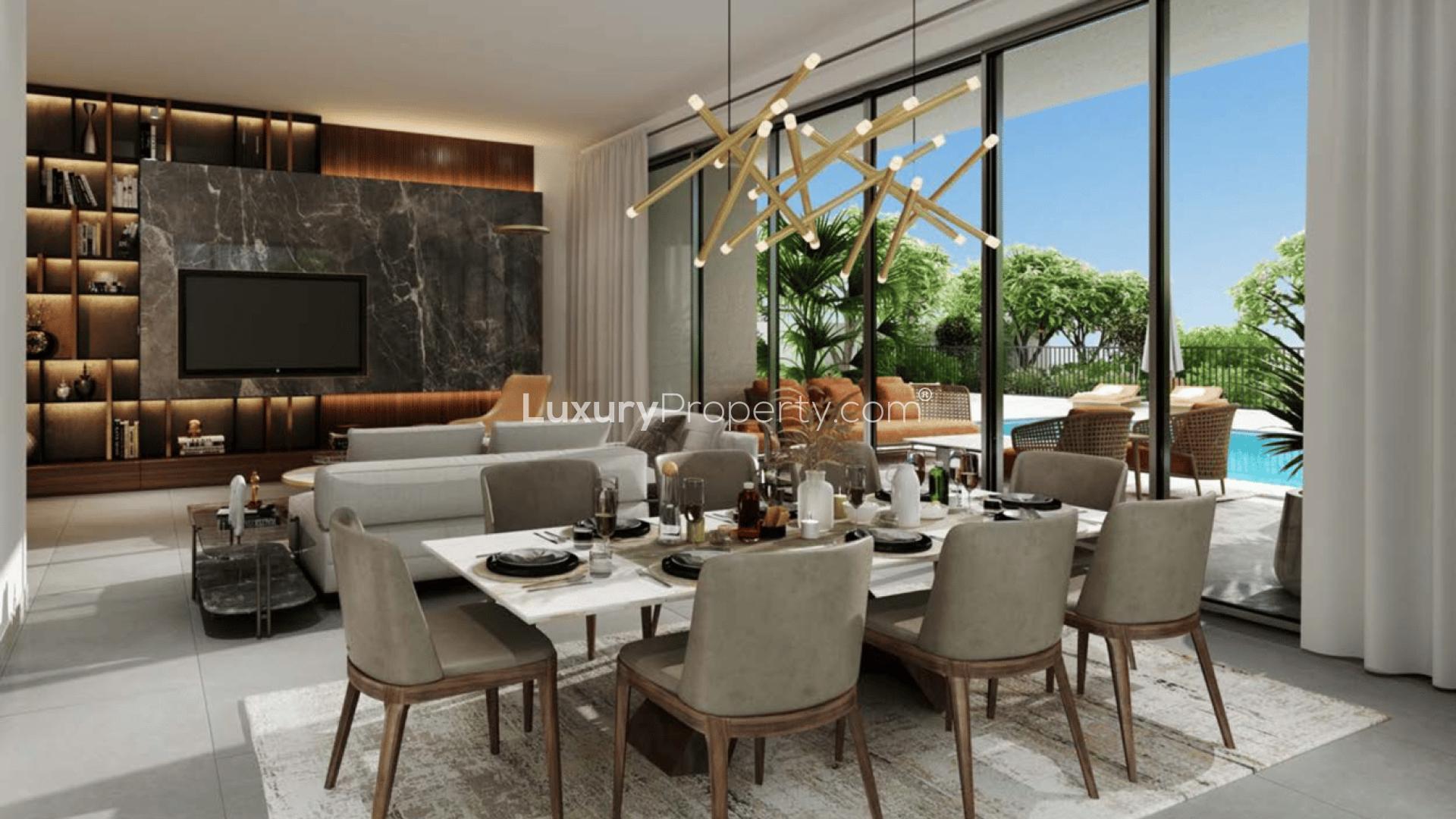 Luxurious living room and patio view in Jebel Ali Village villa for sale