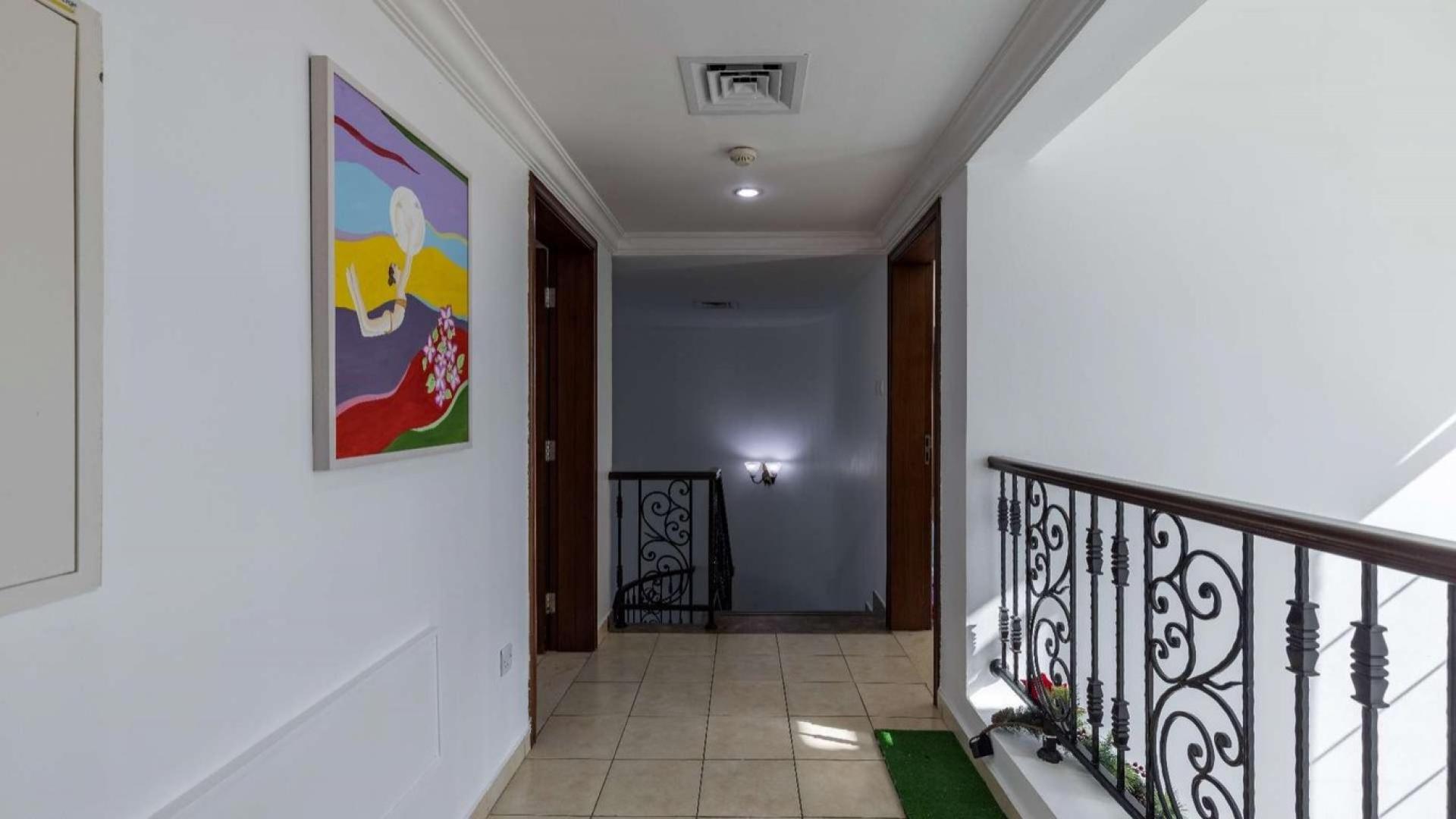 Spanish style villa with garage, garden, and driveway in Jumeirah Islands, European Clusters