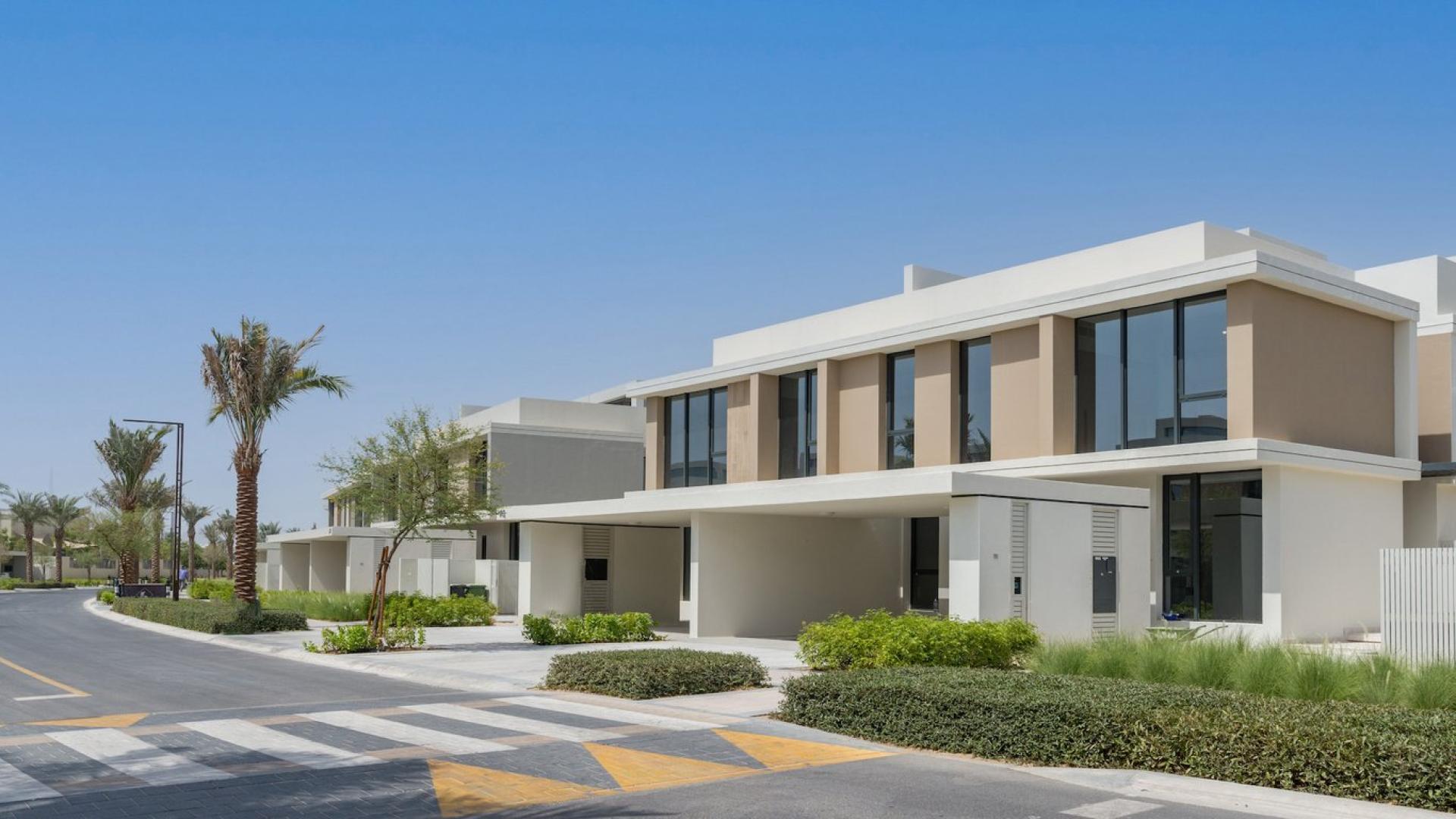 Four-bedroom villa exterior in Dubai Hills Estate, near clubhouse, lush landscaping