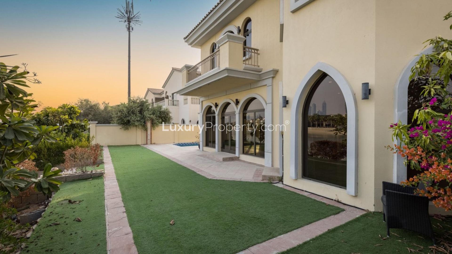 Well-maintained Palm Jumeirah villa with pool, atrium entry, and Atlantis views for sale