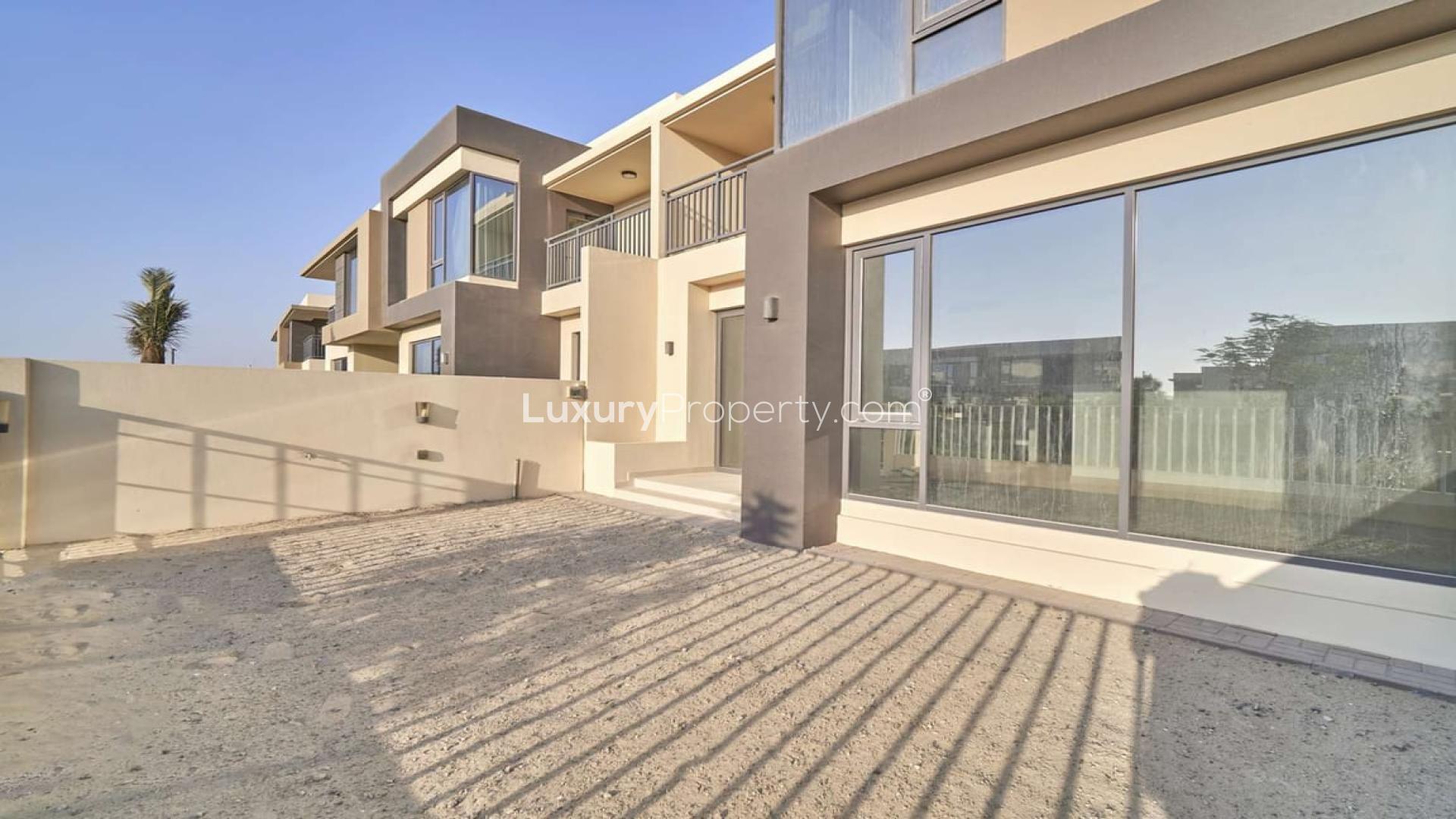 Bright living room with large windows in Maple villa, Dubai Hills Estate