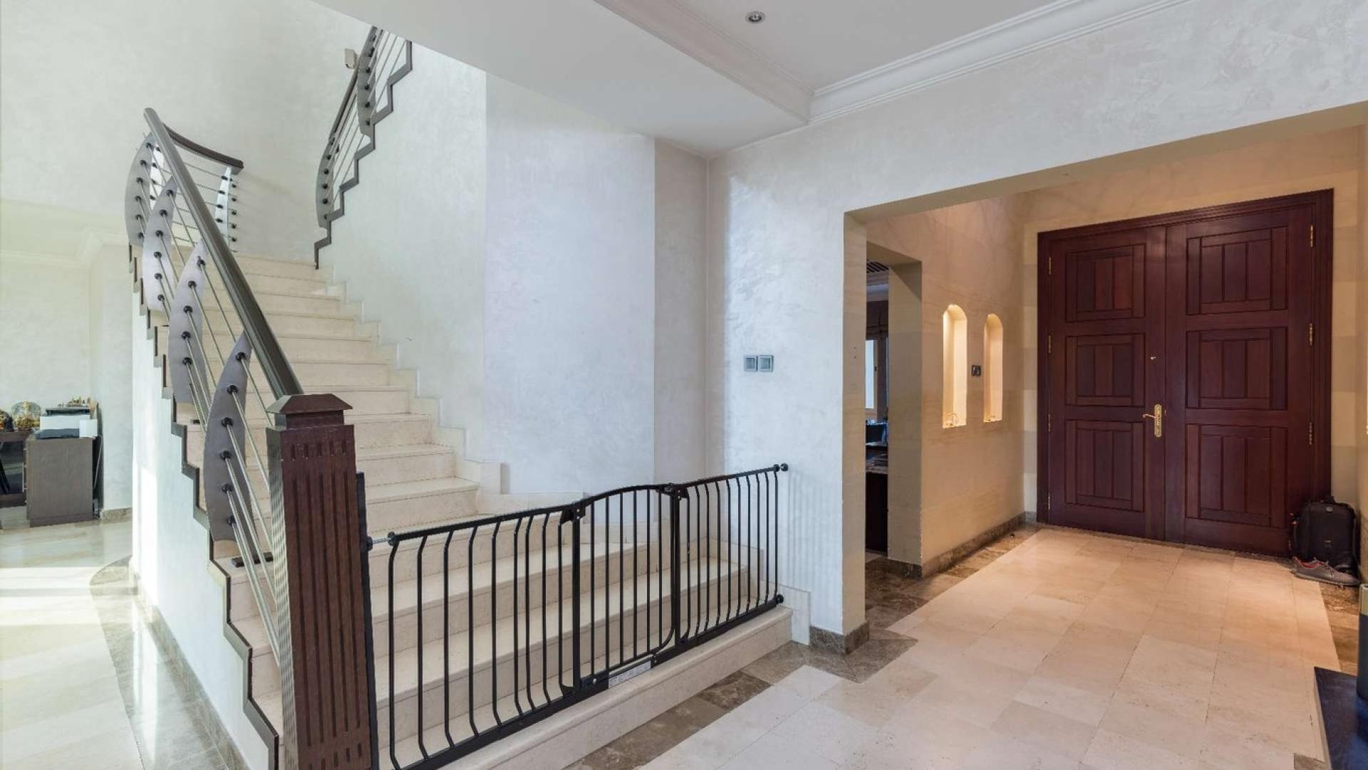 Lakefront villa exterior in Jumeirah Islands, European Clusters, Costa del Sol, for sale