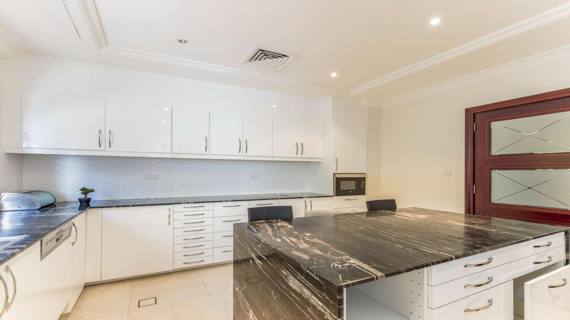 Upgraded villa with private pool and beach view in Palm Jumeirah's Garden Homes