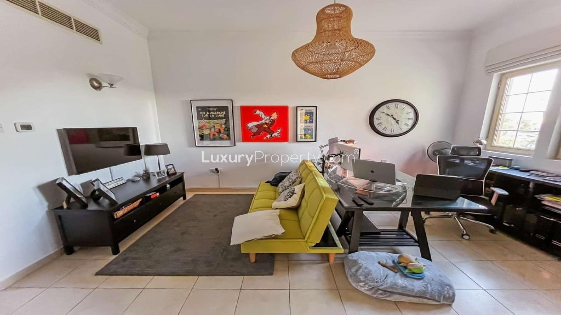 Villa with lake view in Oasis Clusters, Jumeirah Islands, near modern skyline